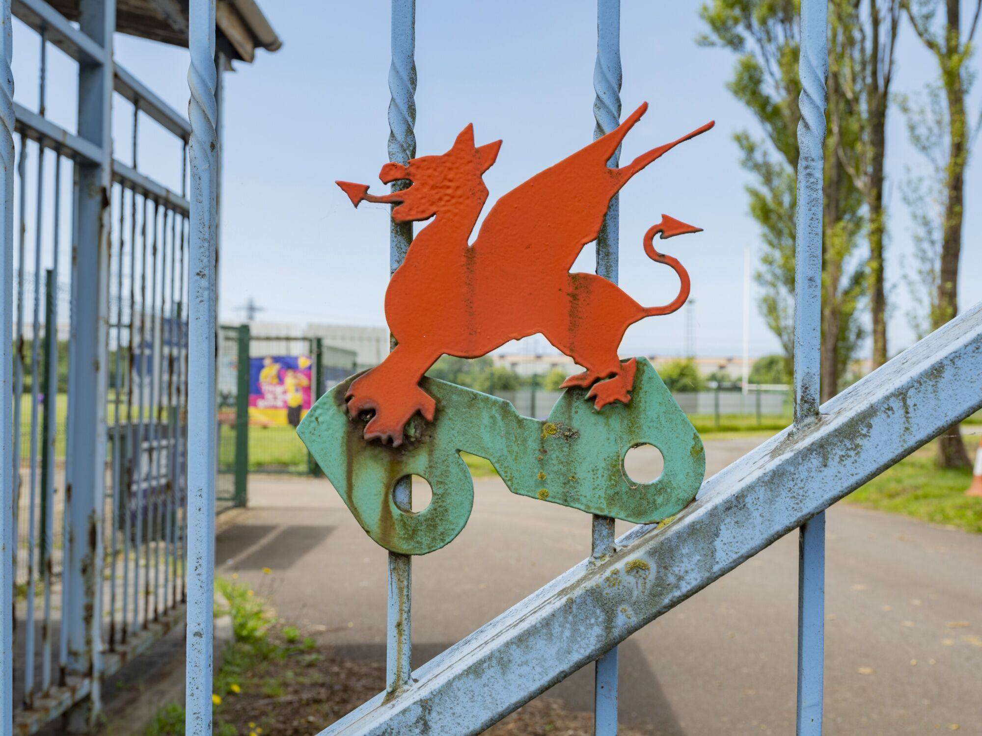 The Welsh dragon on the gates of the Tata Steel sports and social club in Port Talbot, Wales, UK. Photo: Bloomberg