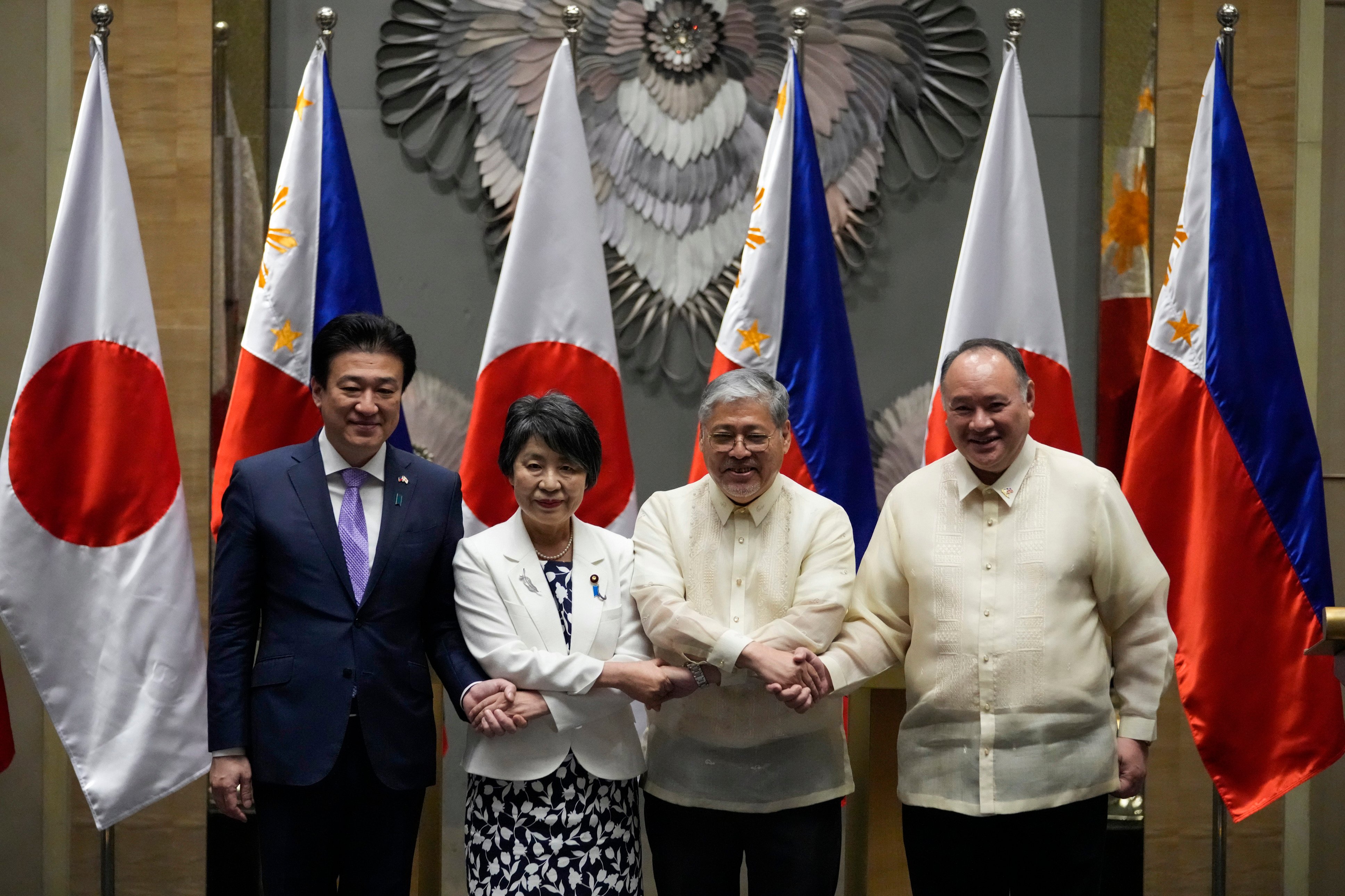 Japanese Defence Minister Minoru Kihara and Foreign Minister Yoko Kamikawa pictured with their Philippine counterparts Enrique Manalo and Gilberto Teodoro after the signing of the deal. Photo: AP