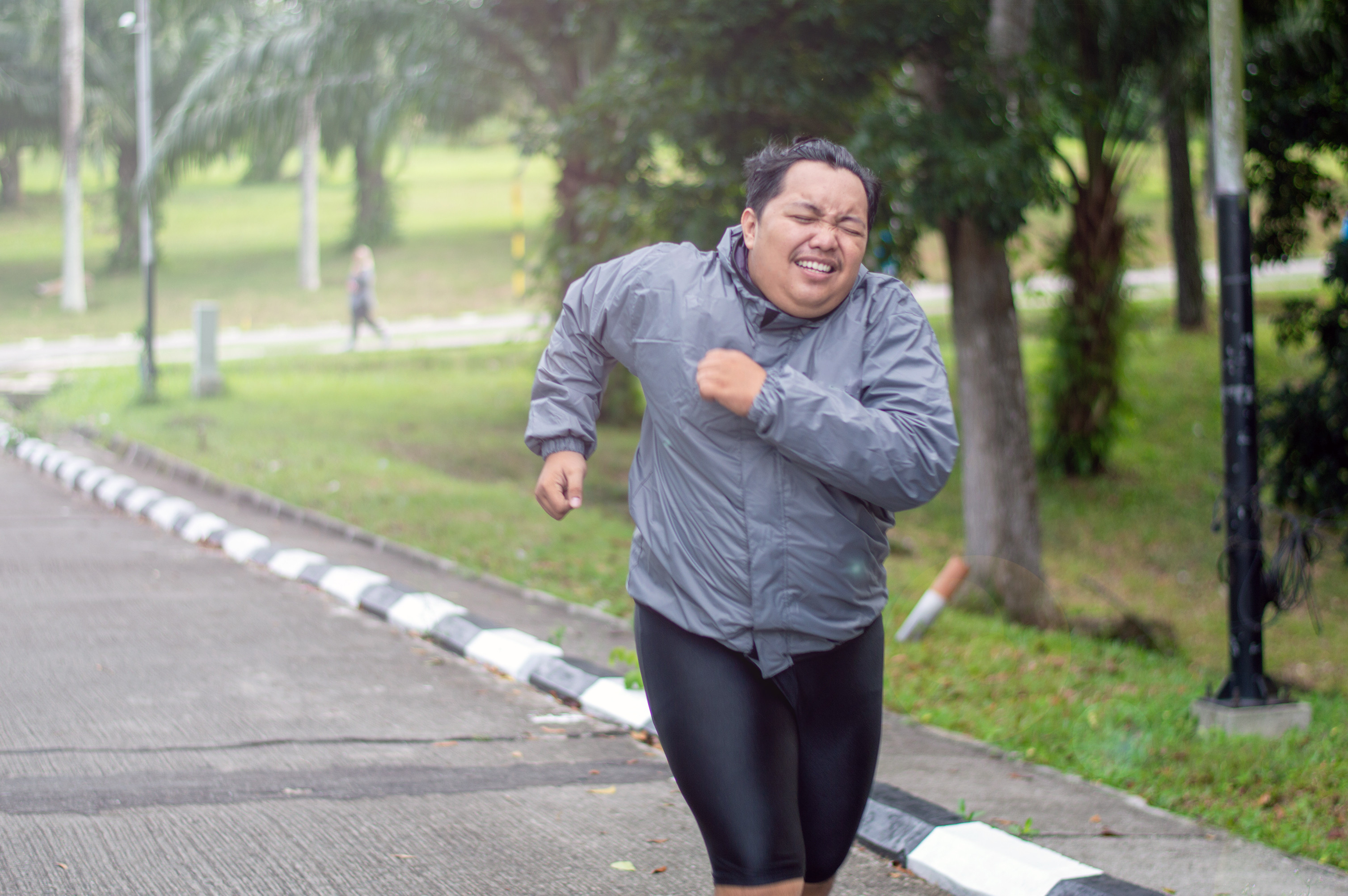 Obese people with belly fat who do 30 minutes of vigorous exercise a week such as running have the same risk of cardiovascular disease as non-obese people, a study found. Photo: Shutterstock