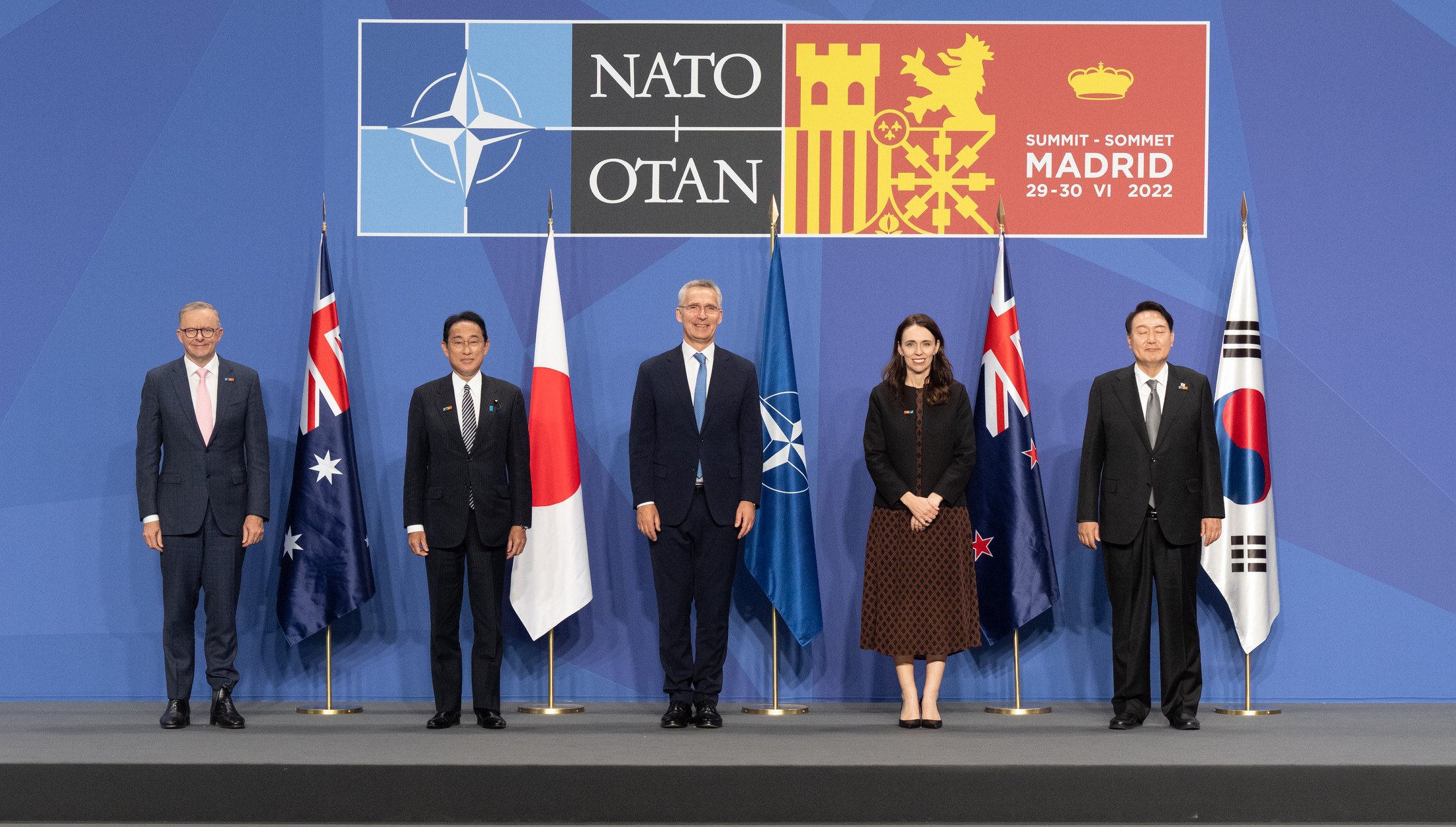 L-R Australian Prime Minister Anthony Albanese, Japanese Prime Minister Fumio Kishida, NATO Secretary General Jens Stoltenberg, New Zealand Prime Minister Jacinda Ardern and South Korean President Suk Yeol Yoon pose for a group photo on the sidelines of a NATO Summit on June 29, 2022. Photo: dpa 