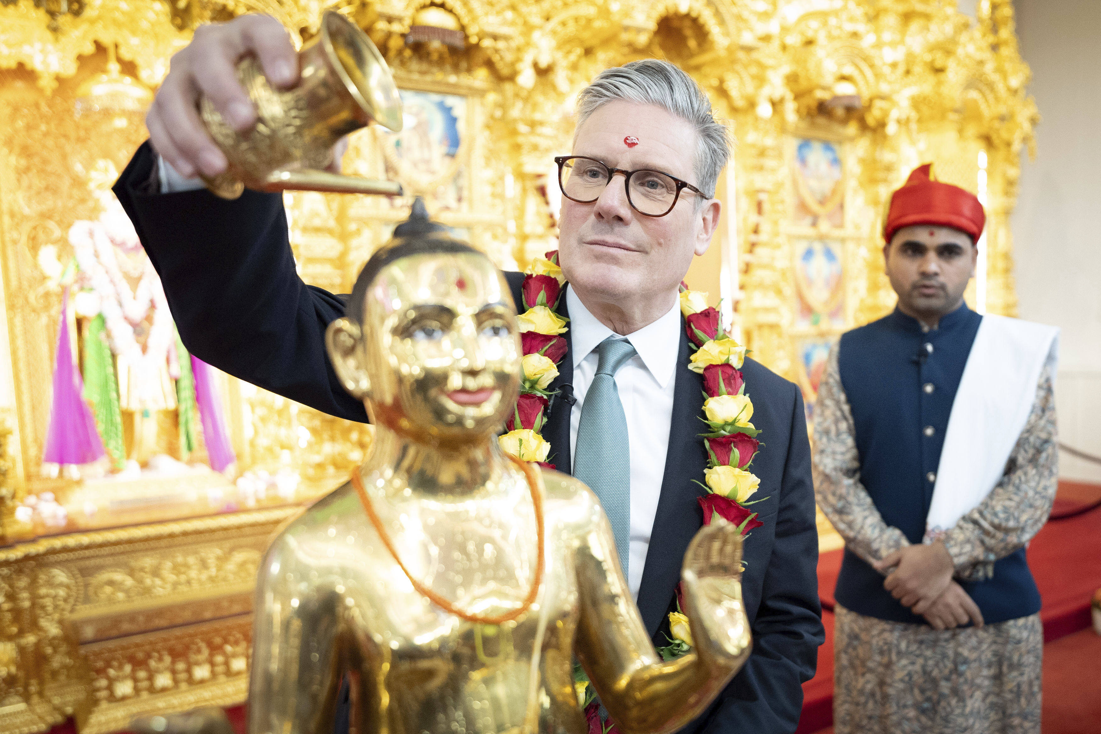 Labour Party leader Sir Keir Starmer during a visit to the Shree Swaminarayan Mandir Hindu temple in Kingsbury, London, while on the election campaign trail on June 28. Photo: AP
