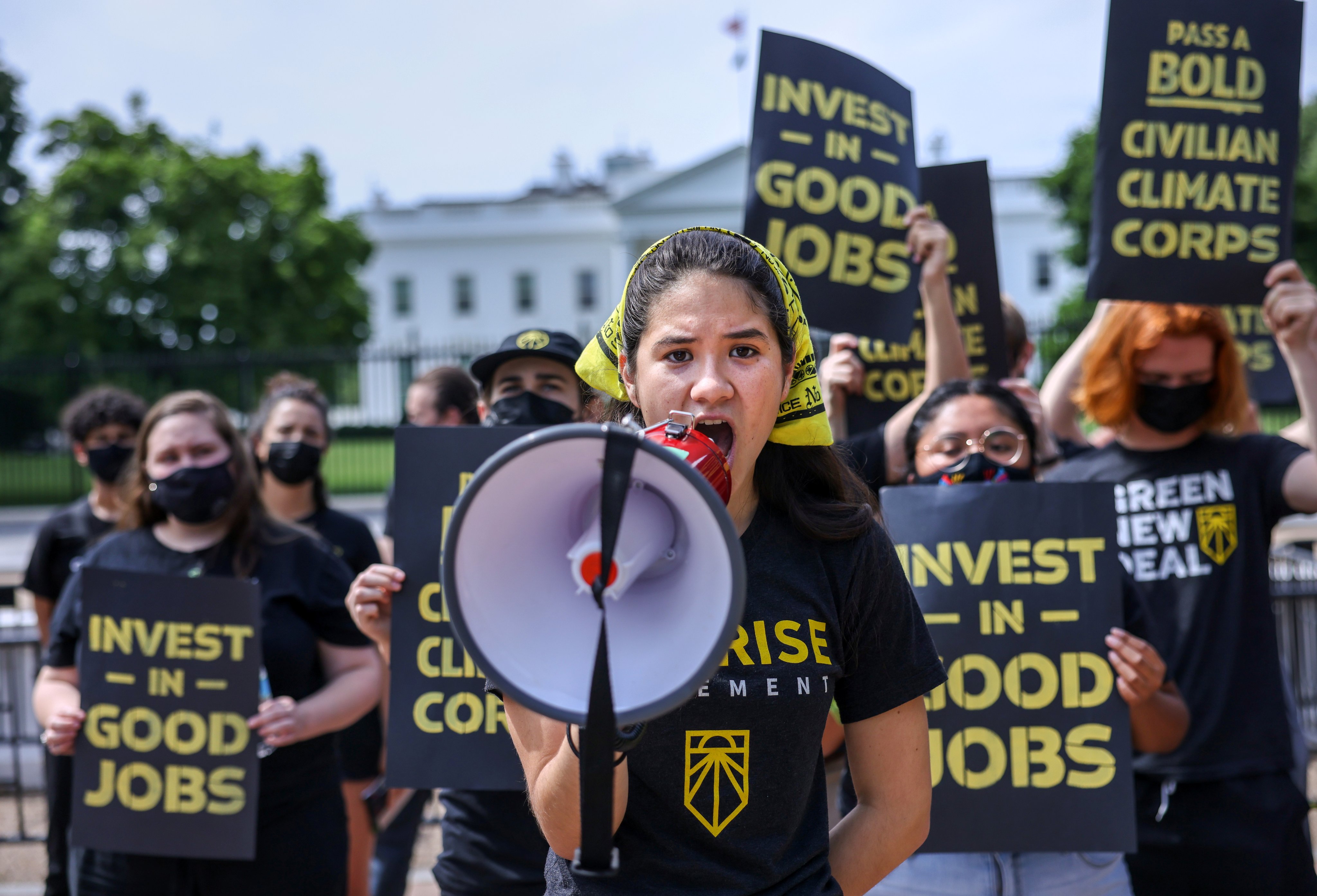 Protesters from the Sunrise Movement demonstrate outside the White House demanding action on climate change and green jobs, in Washington, US, on June 4, 2021. Photo: Reuters