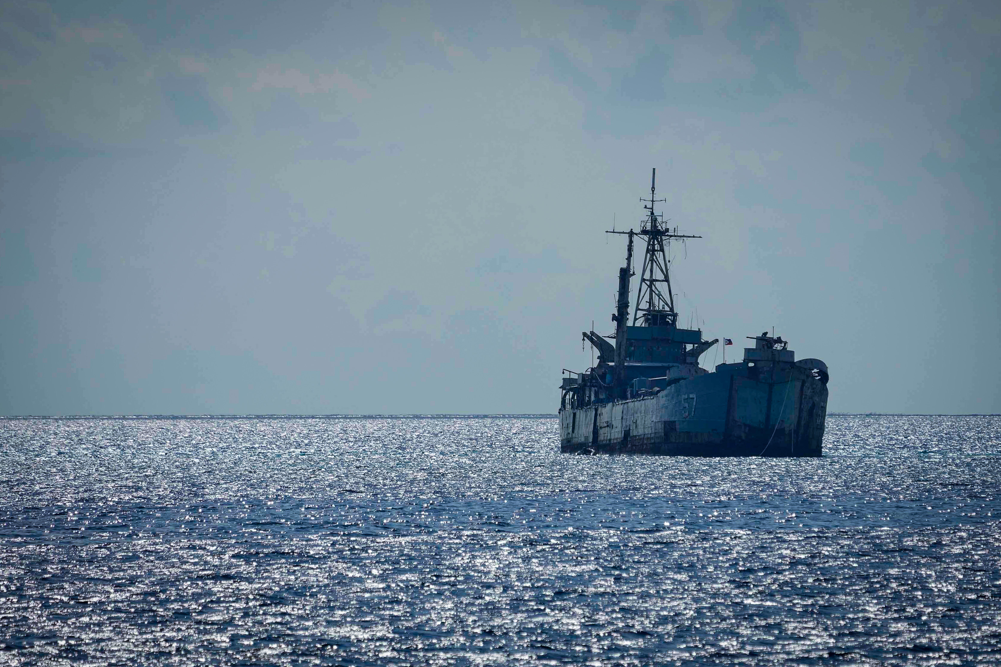 China says it allowed the Philippines to evacuate an ill person from an  “illegally grounded warship”, the BRP Sierra Madre pictured, under “humanitarian considerations” and denies it blocked the medical transport. Photo: AP