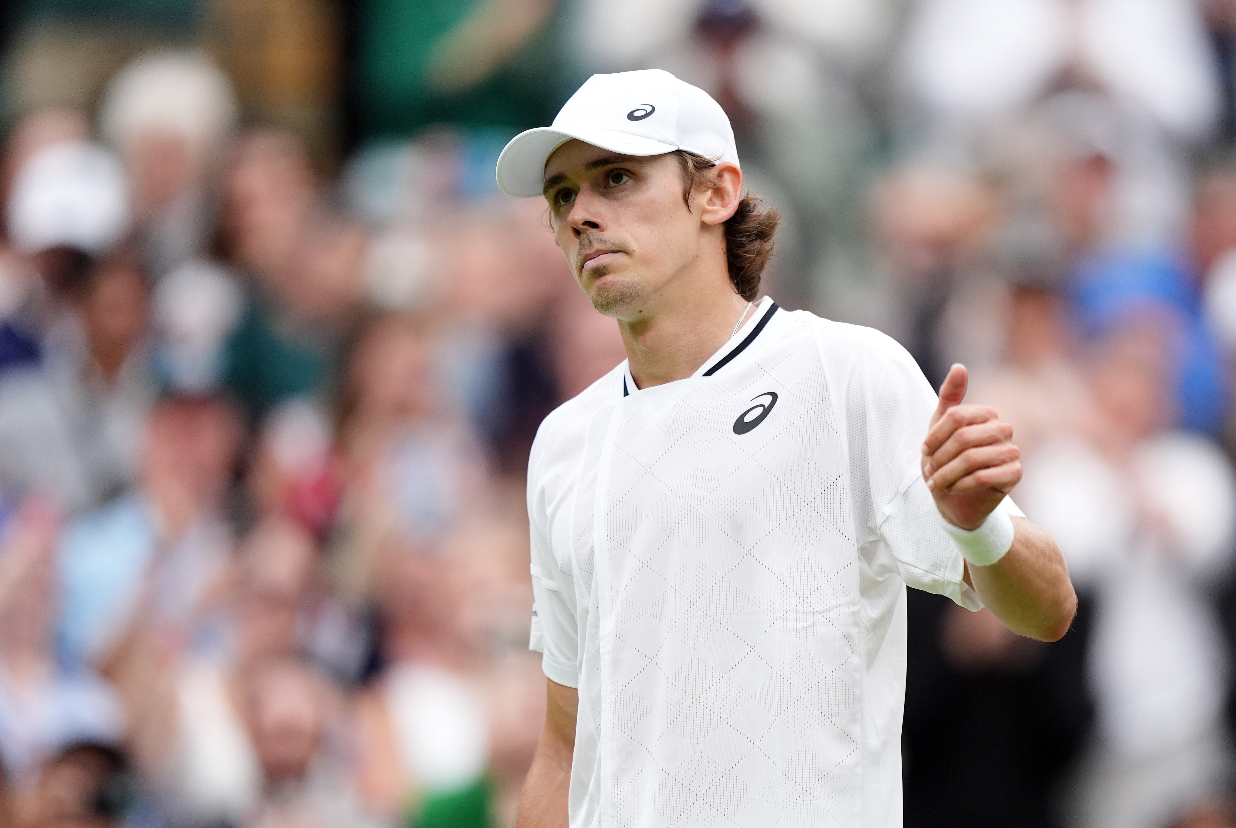 Australia’s Alex de Minaur has been forced to withdraw from the men’s singles at Wimbledon. Photo: DPA