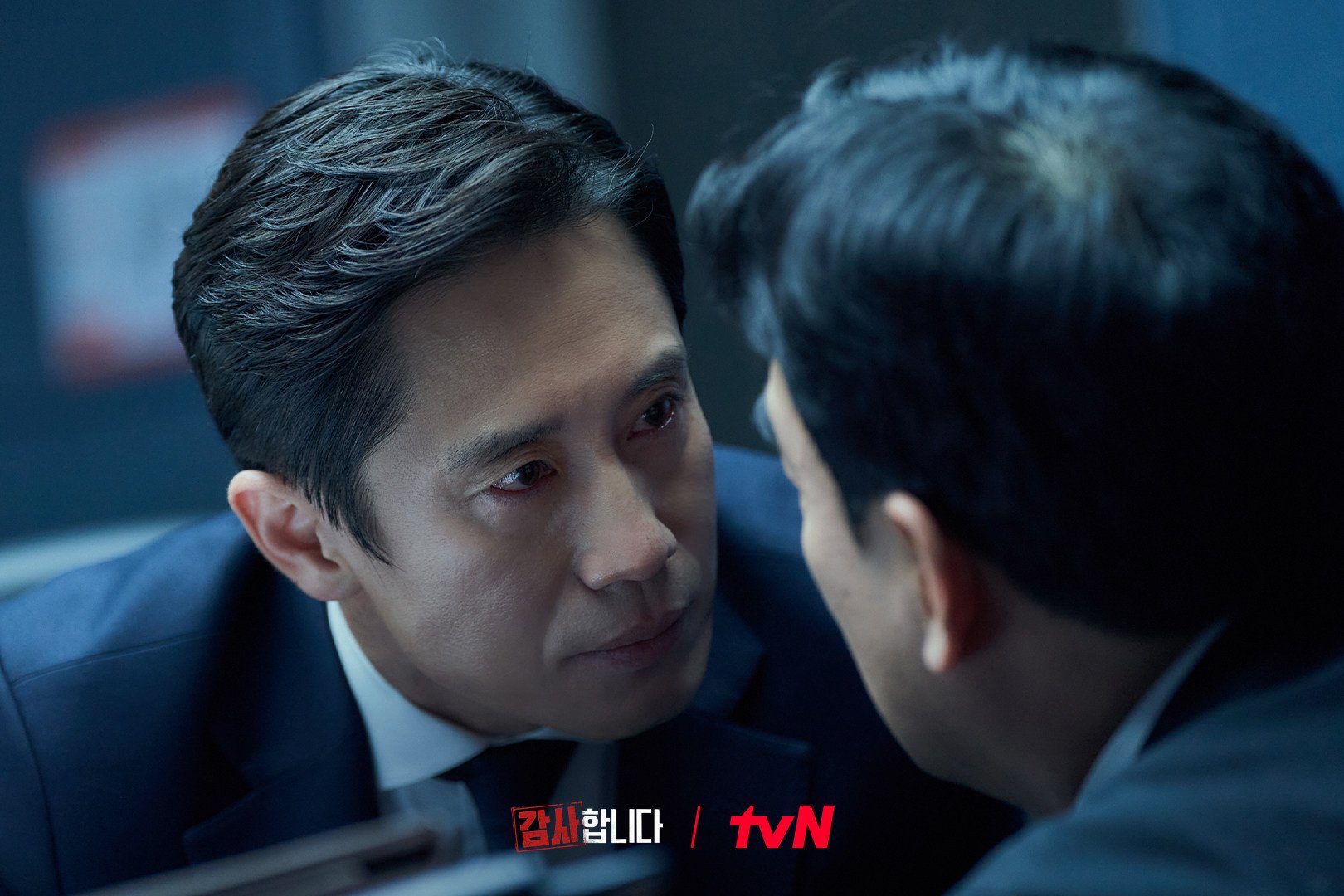 Shin Ha-kyun as auditor Shin Cha-il in a still from K-drama The Auditors.