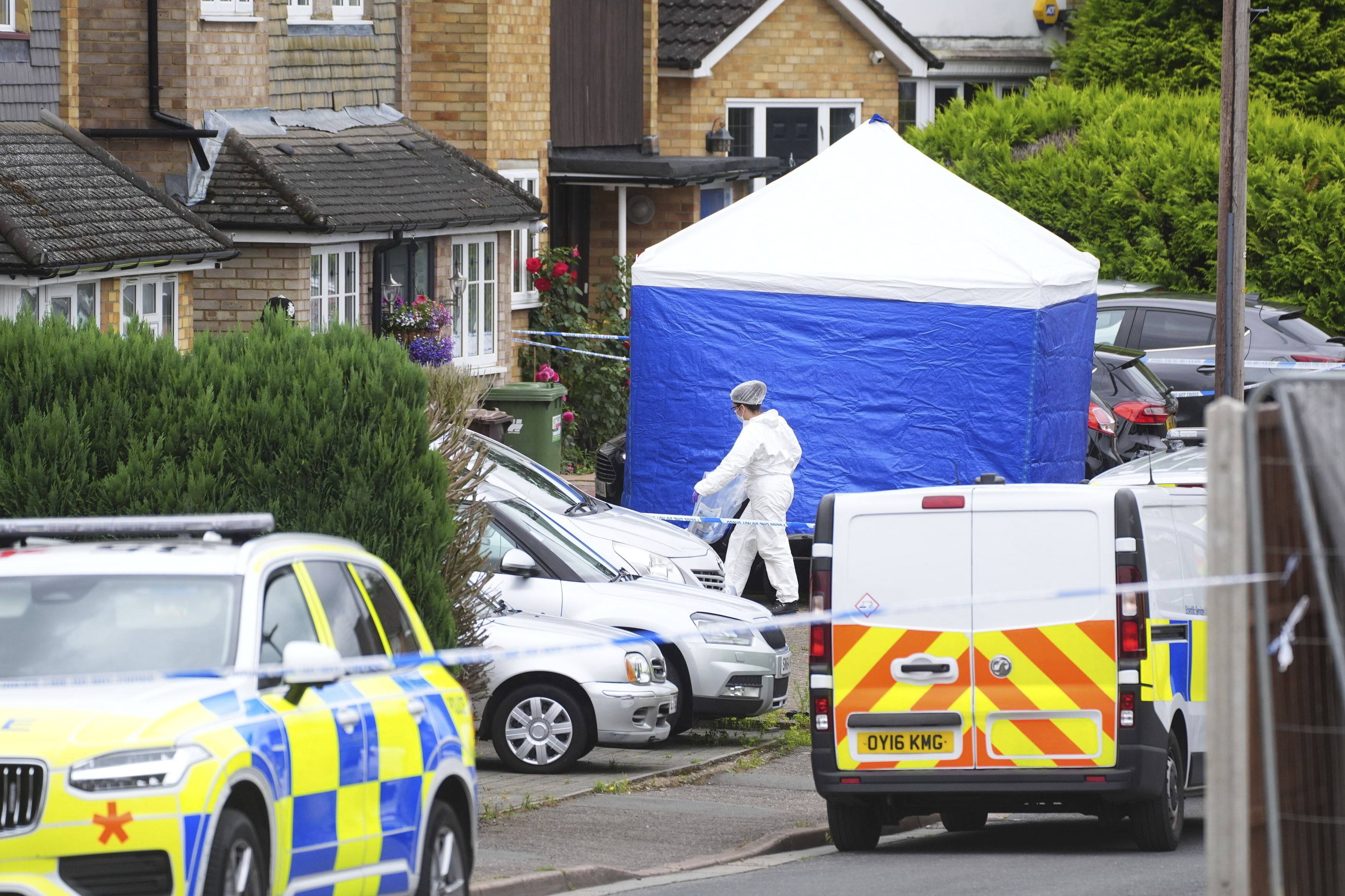 British police were hunting for a man believed to be armed with a crossbow after three women were killed in a house near London. Photo: AP