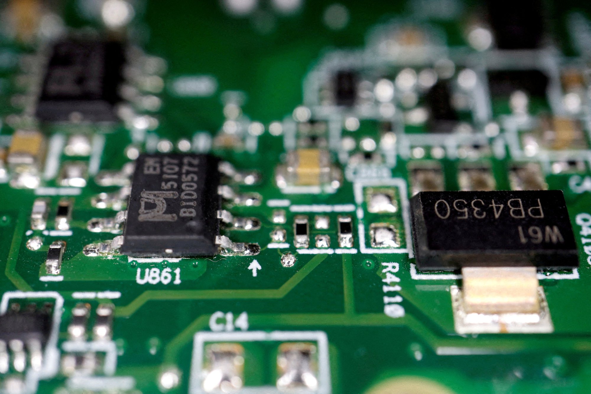 Semiconductors are seen on a printed circuit board in this illustration picture taken February 17, 2023. Photo: Reuters