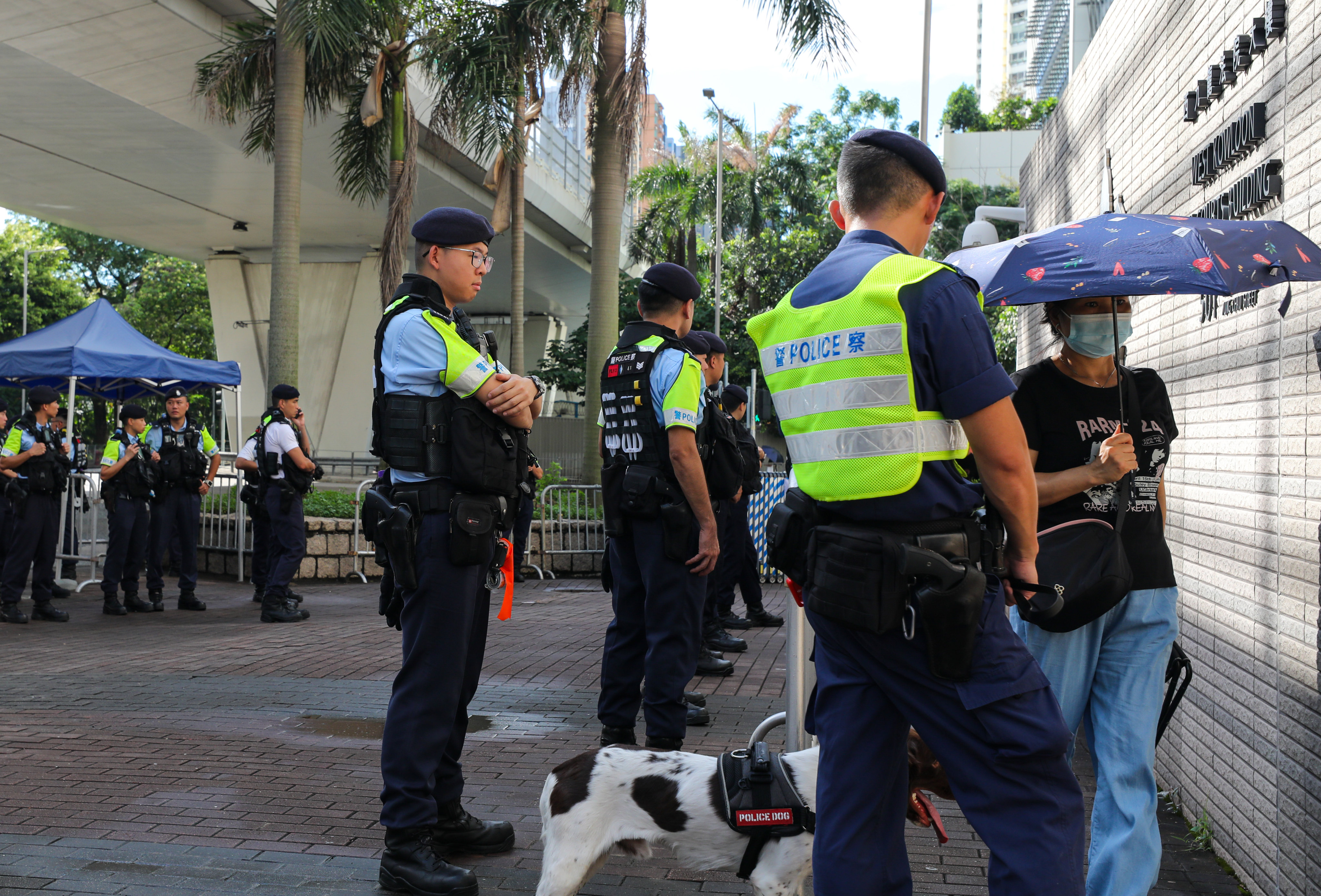 Hong Kong police at West Kowloon Court amid the city’s largest national security trial. Photo: Xiaomei Chen