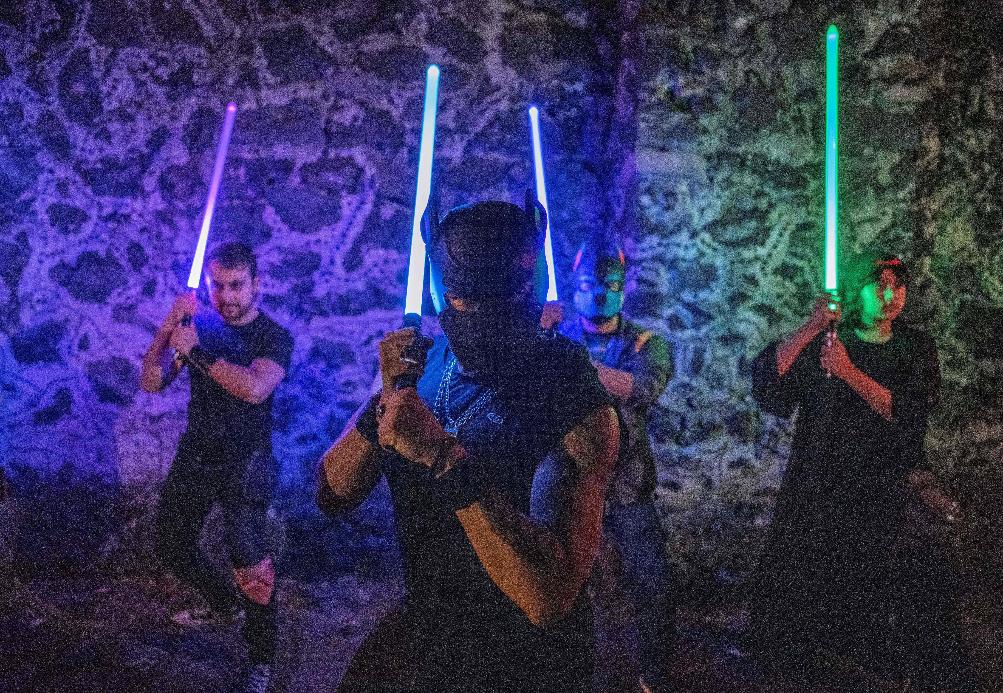 Members of the Jedi Knight Academy (JKAMX) hold lightsabers during training at a park in Mexico City. Photo: AFP