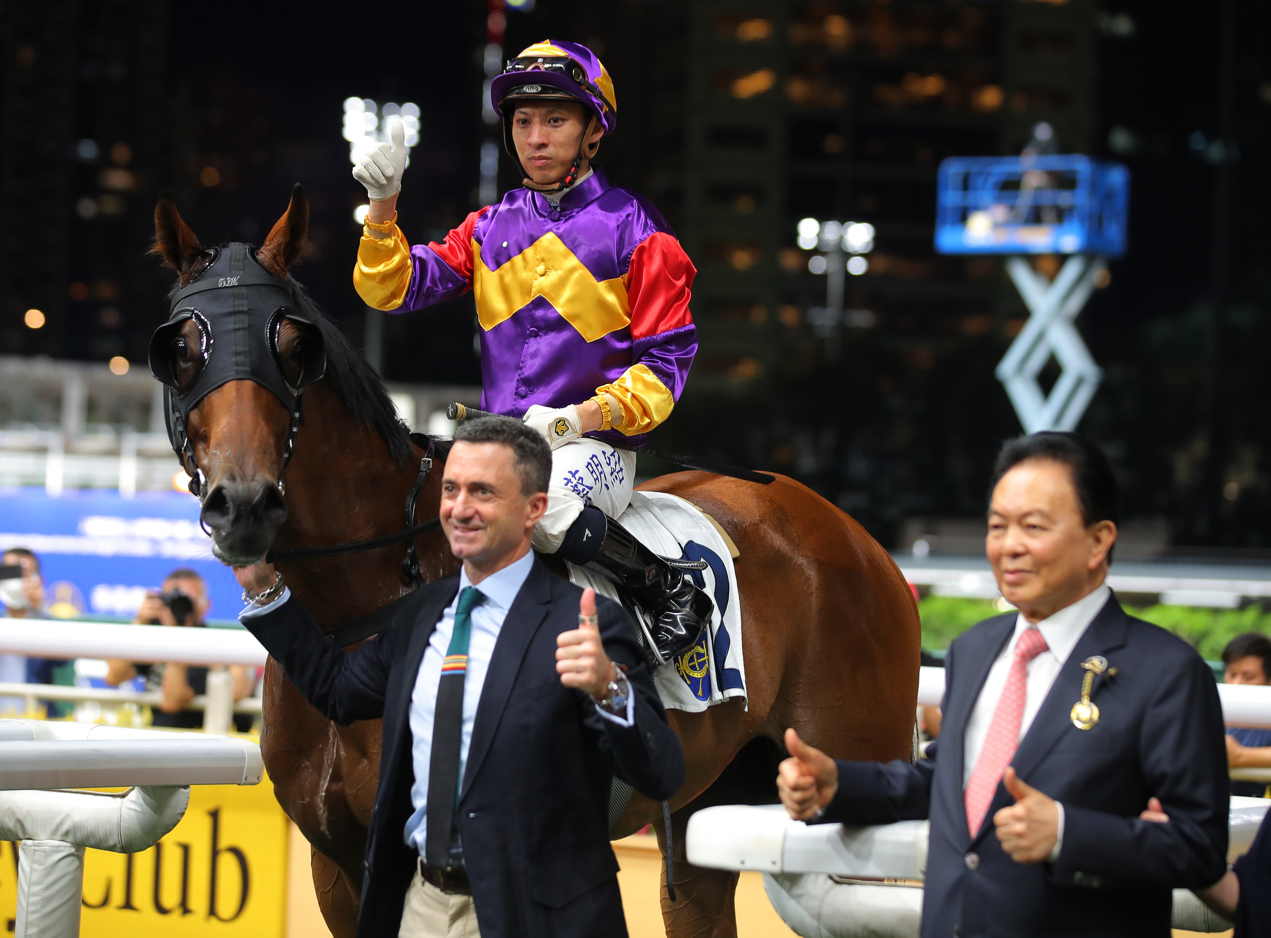 Douglas Whyte and Matthew Chadwick with Lucky Planet after his Happy Valley win. Photos: Kenneth Chan