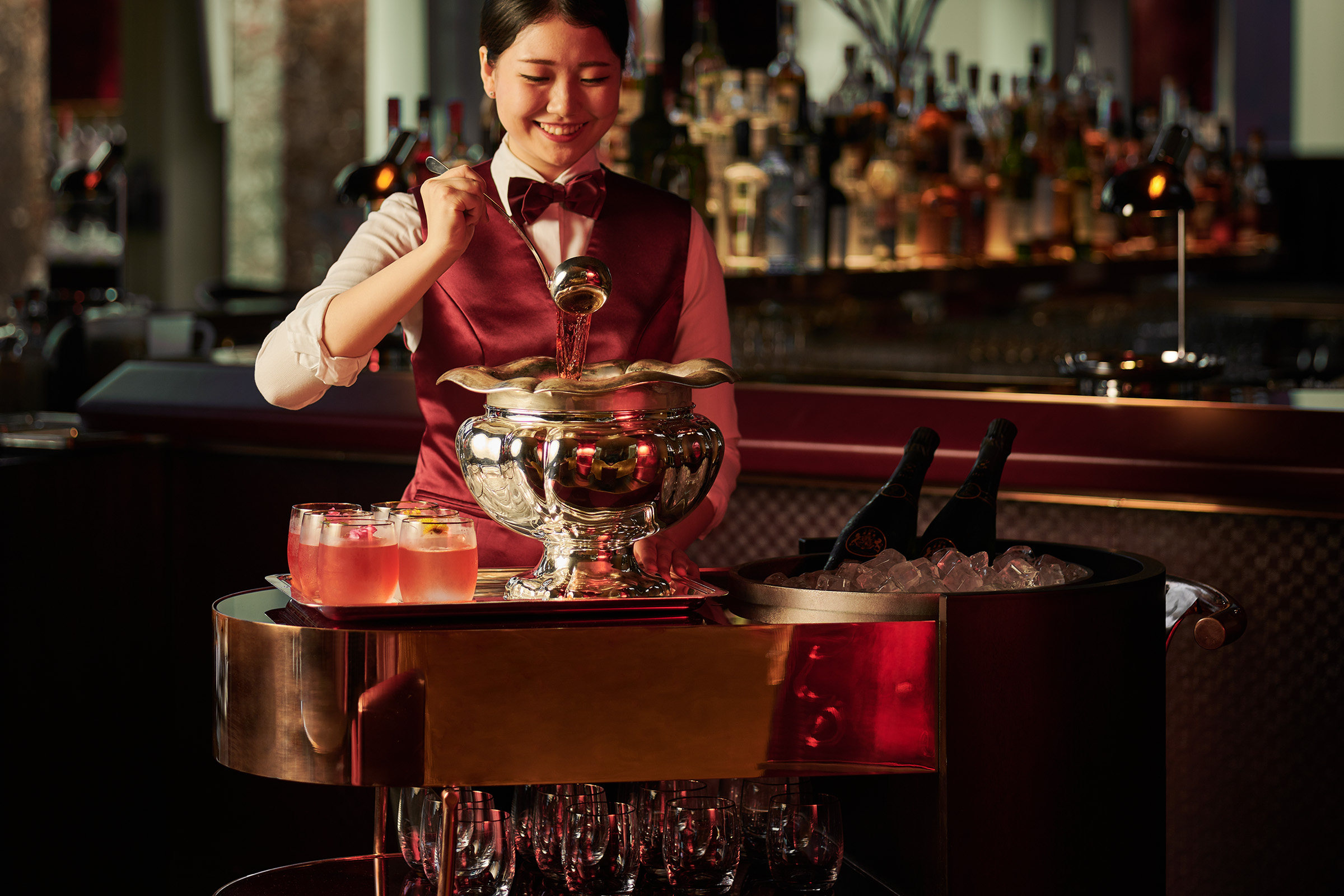 A waitress serves punch at Republic in the Ritz-Carlton Millenia Singapore, the highest ranked among eight Singapore bars on the Asia’s 50 Best Bars 2024 long list of bars ranked from 51 to 100. Photo: Ritz-Carlton Millenia Singapore