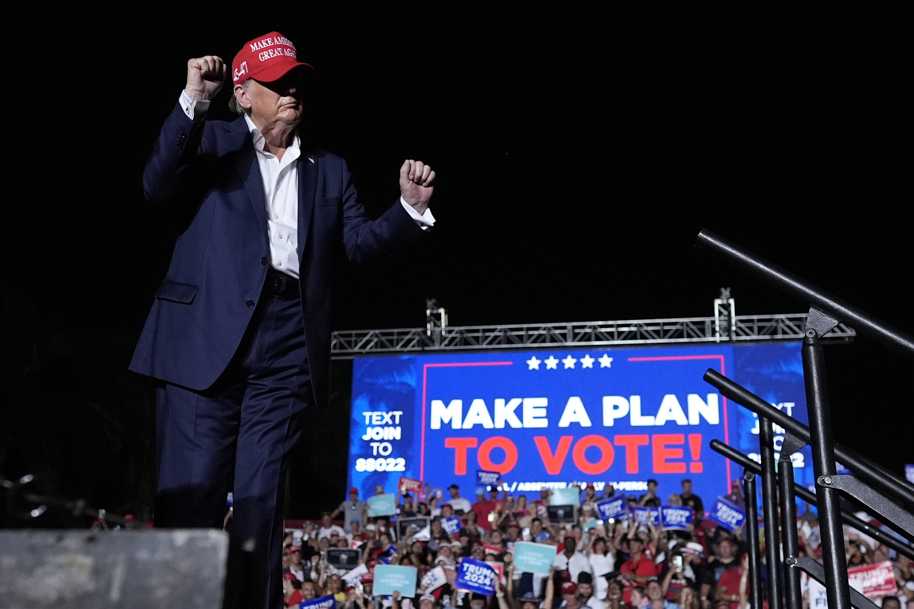 Donald Trump dances at a campaign rally in Doral, Florida on Tuesday. Photo: AP