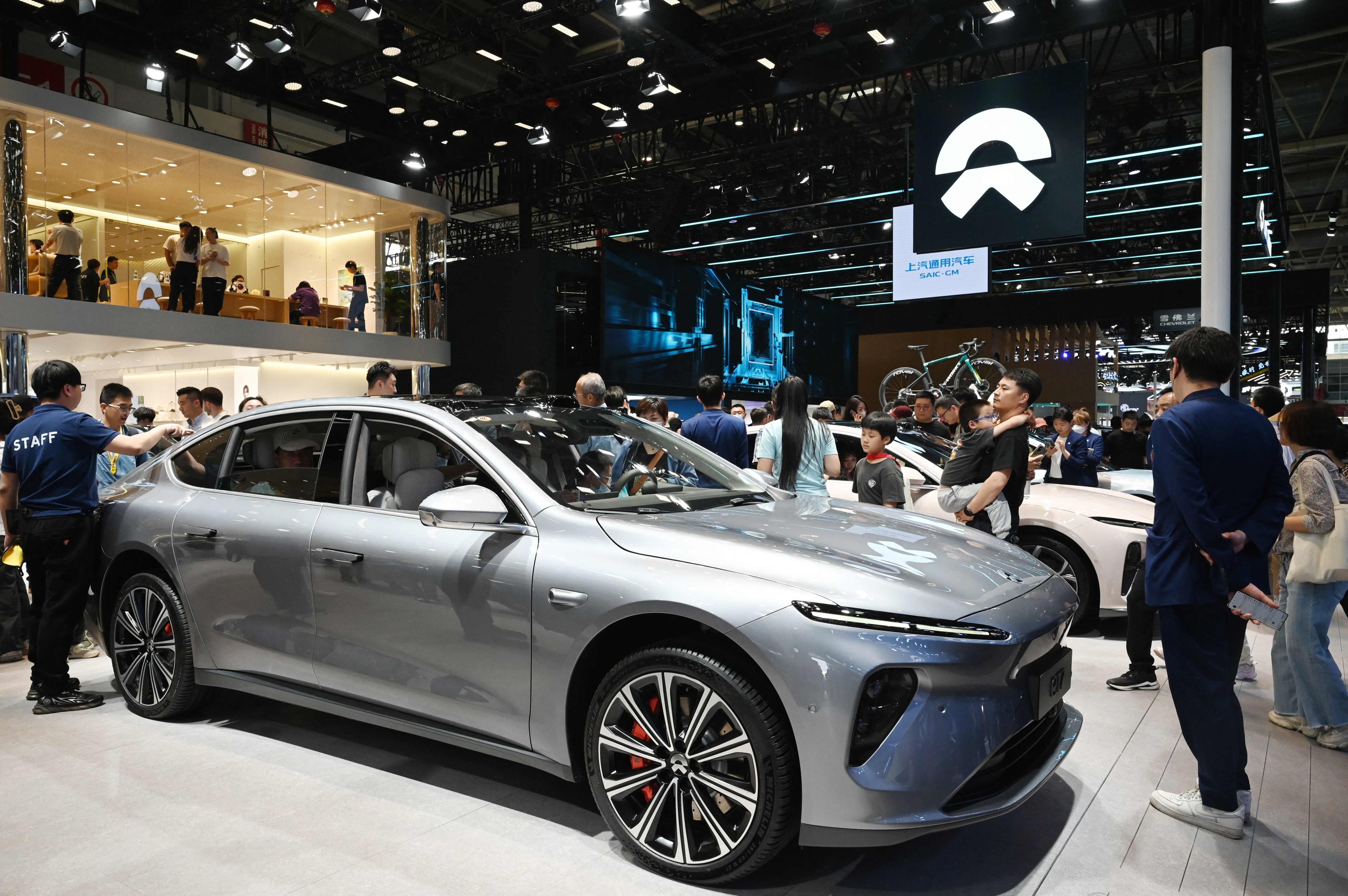 People look at a Nio ET7 at the Beijing Auto Show in Beijing on May 3, 2024. Photo: AFP