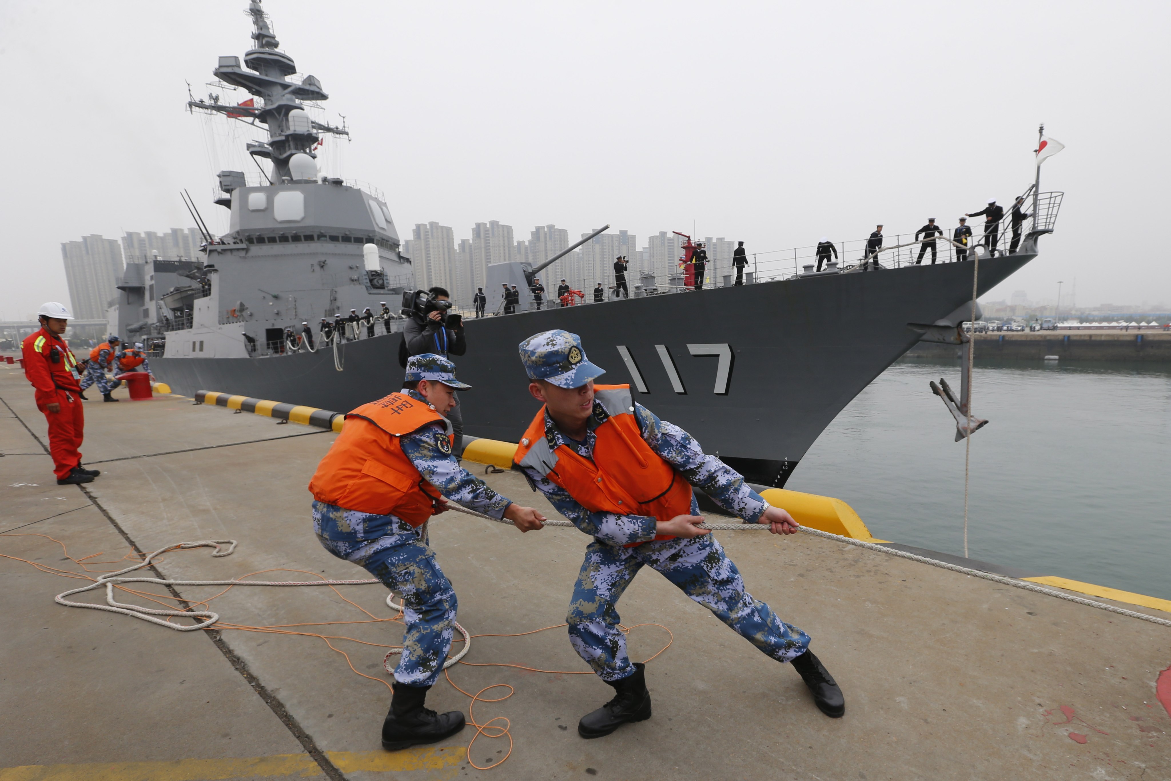 Japanese destroyer Suzutsuki docks at a port in China’s Qingdao in 2019. Photo: EPA-EFE