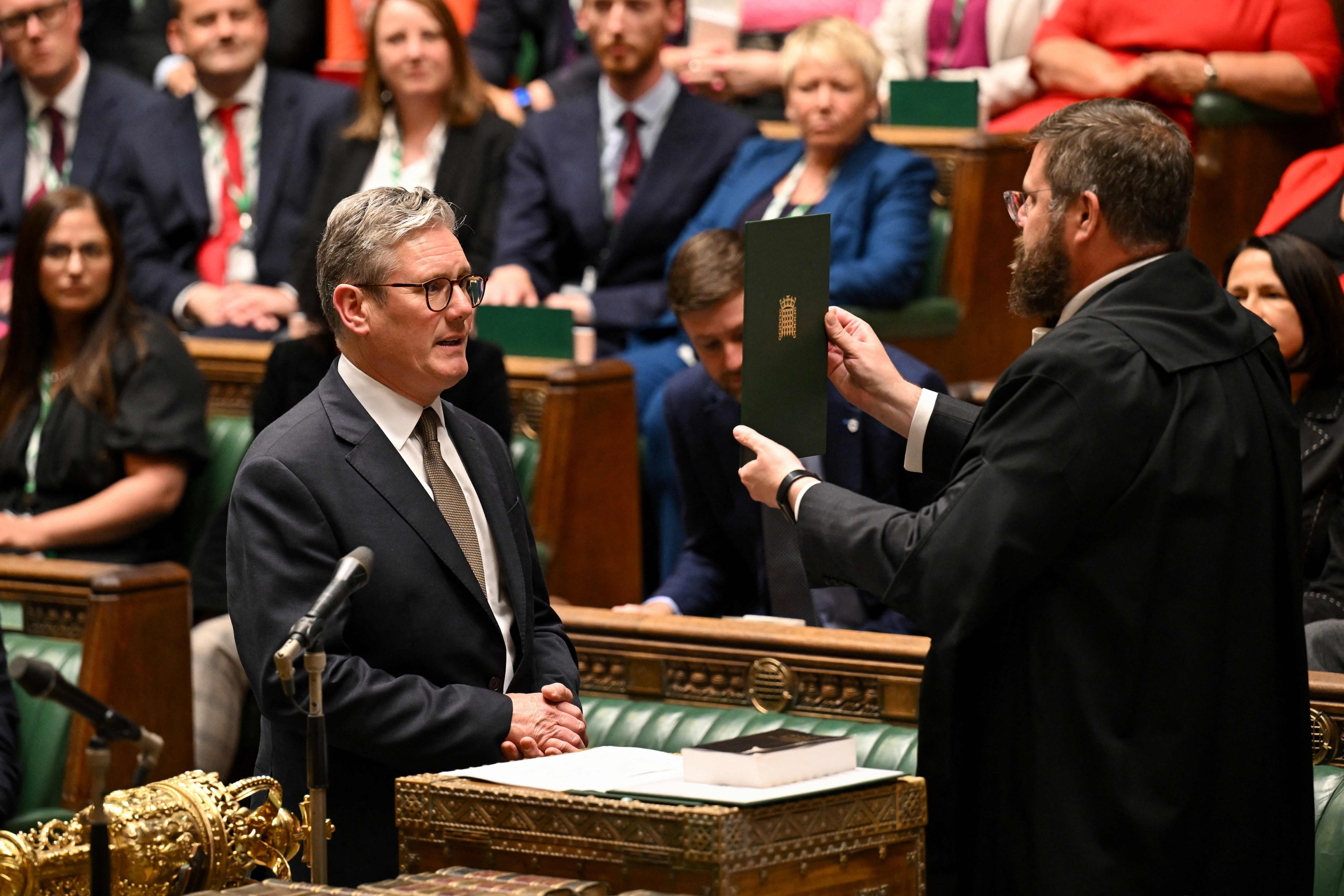 Keir Starmer is sworn in as British prime minister as members of parliament meet for the first time since the general election, at the House of Commons in London on July 9. Starmer’s Labour Party has a large majority but also a wide array of problems to solve after 14 years of Conservative government. Photo: Handout