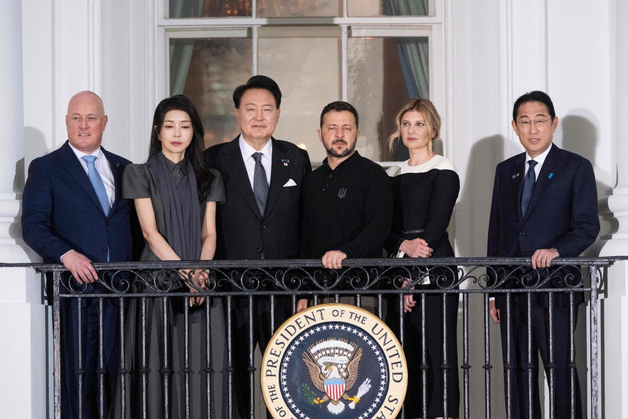 New Zealand PM Christopher Luxon, South Korea President Yoon Suk-yeol, his wife Kim Keon-hee, Ukrainian President Volodymyr Zelensky and his wife Olena Zelenska and Japanese PM Fumio Kishida at the White House for the Nato summit. Photo: AFP