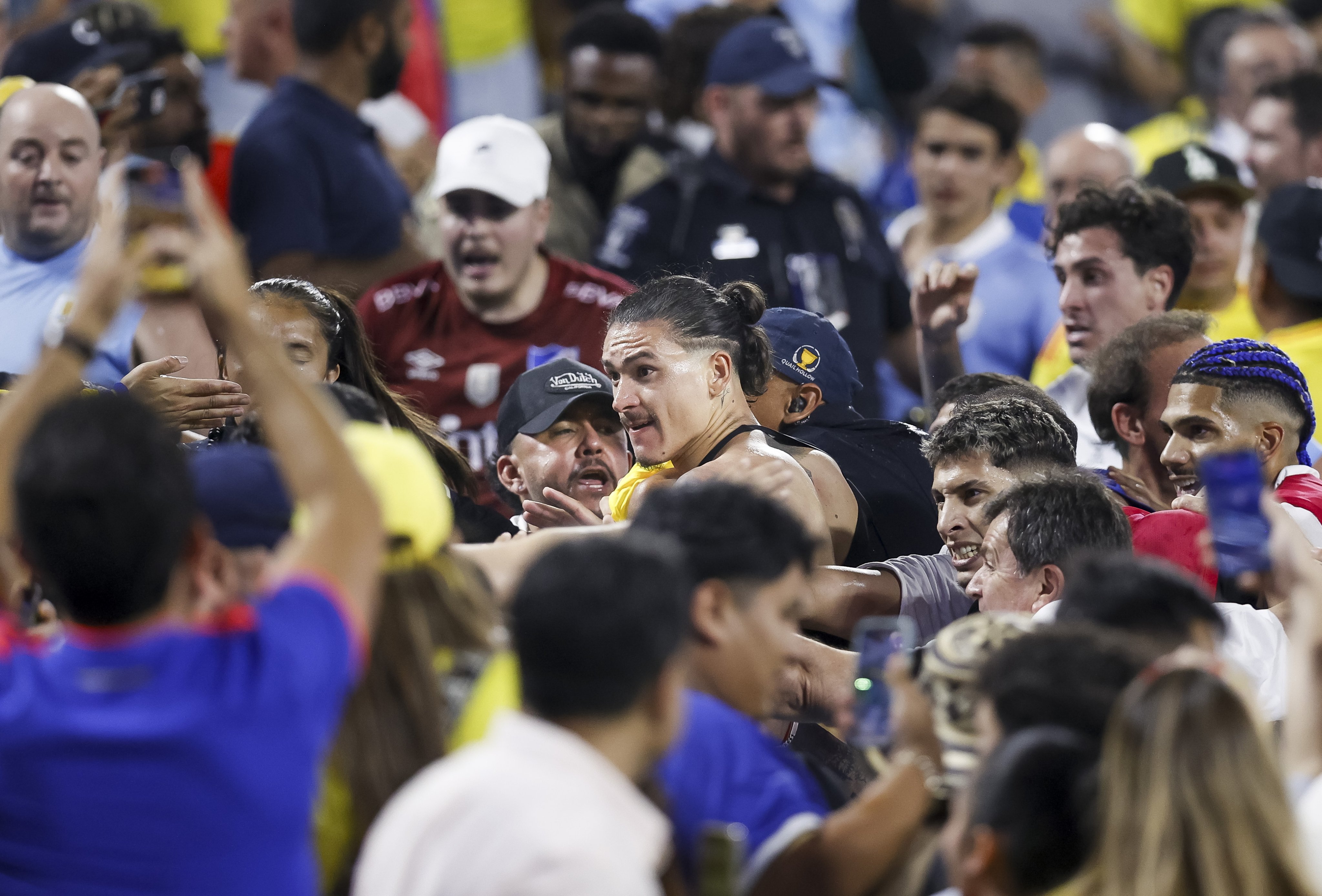 Uruguay’s Darwin Nunez (centre) scuffles with fans after Uruguay lost to Colombia 1-0 in the Copa America semi-finals in Charlotte, North Carolina in the United States. Photo: EPA-EFE