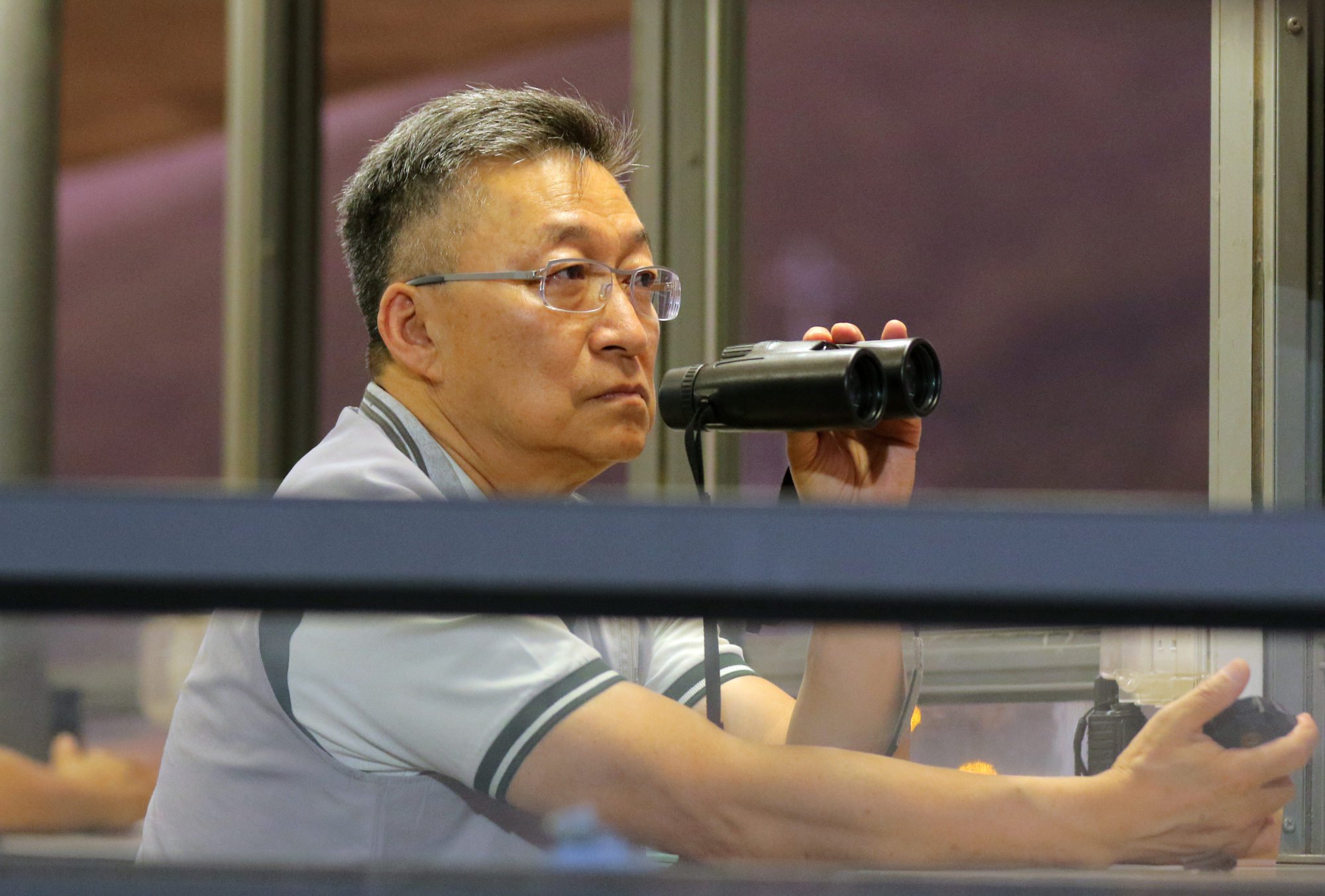 Francis Lui watches on at trackwork.