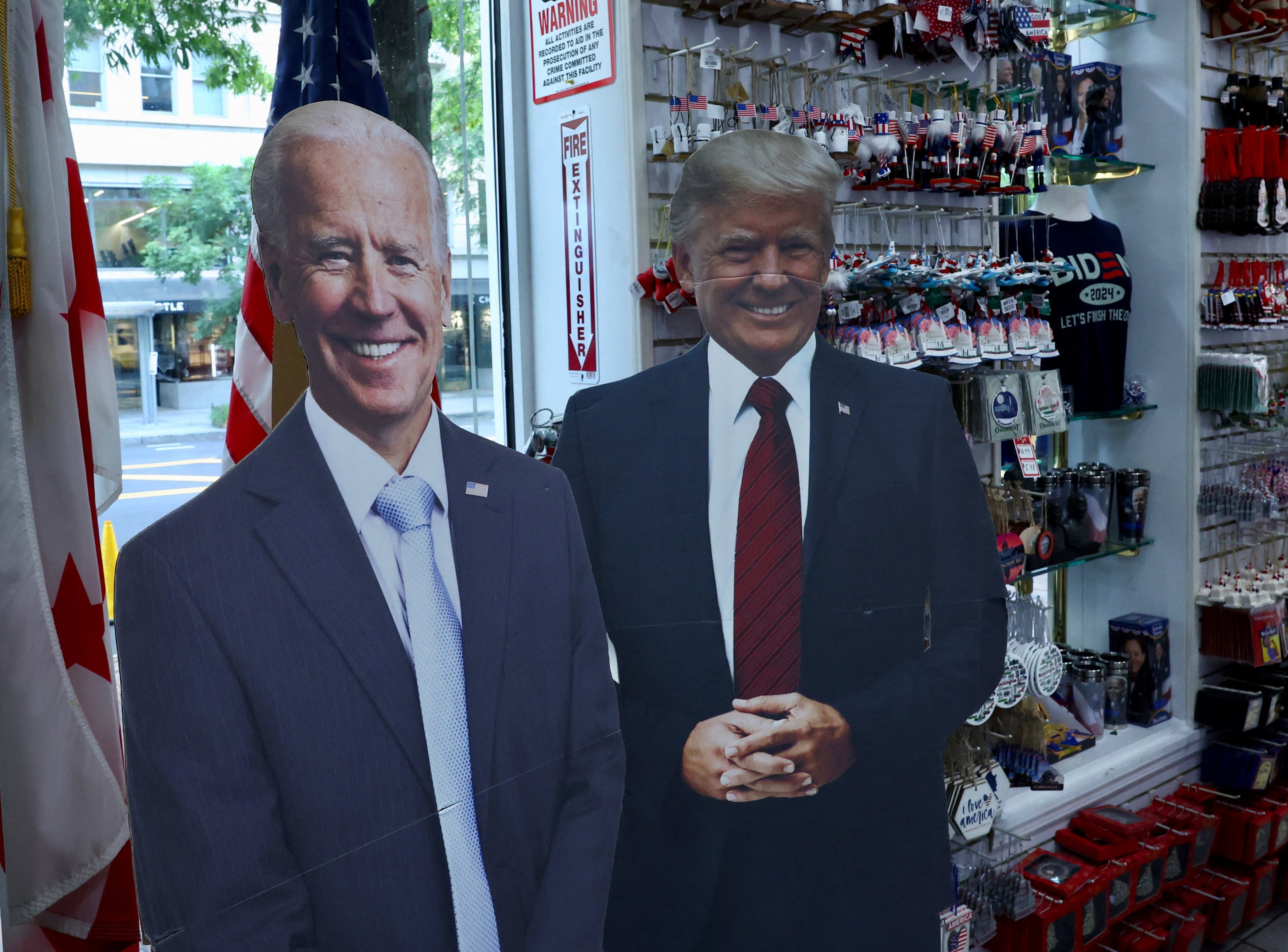 Cut-outs depicting Joe Biden and Donald Trump, the current and previous US presidents, displayed at a souvenir shop in Washington on Wednesday. Photo: Reuters