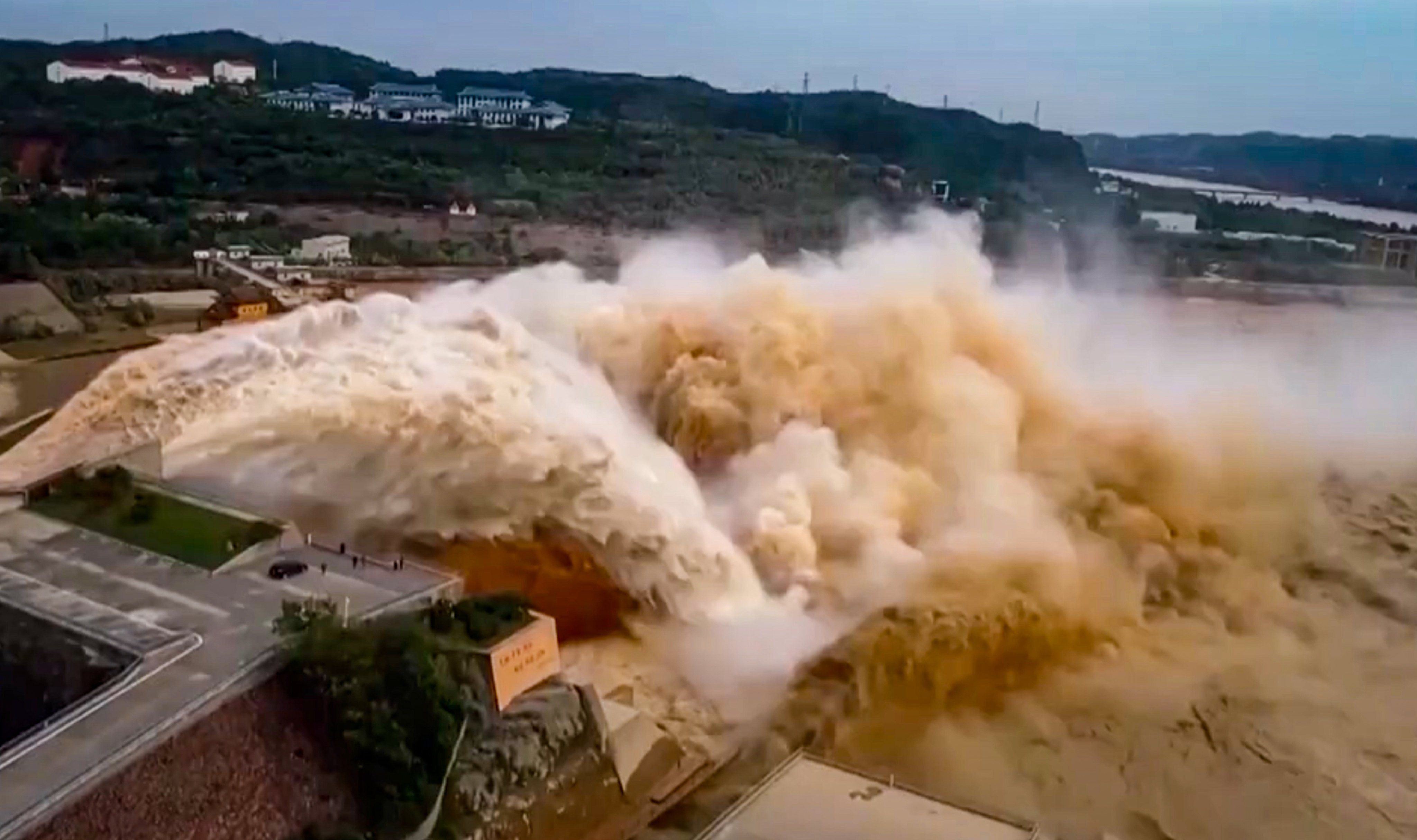 China on Tuesday began construction of what will be the third largest dam on the Yellow River. The major waterway is notorious for excessive silt and sometimes devastating flooding. Photo: CCTV