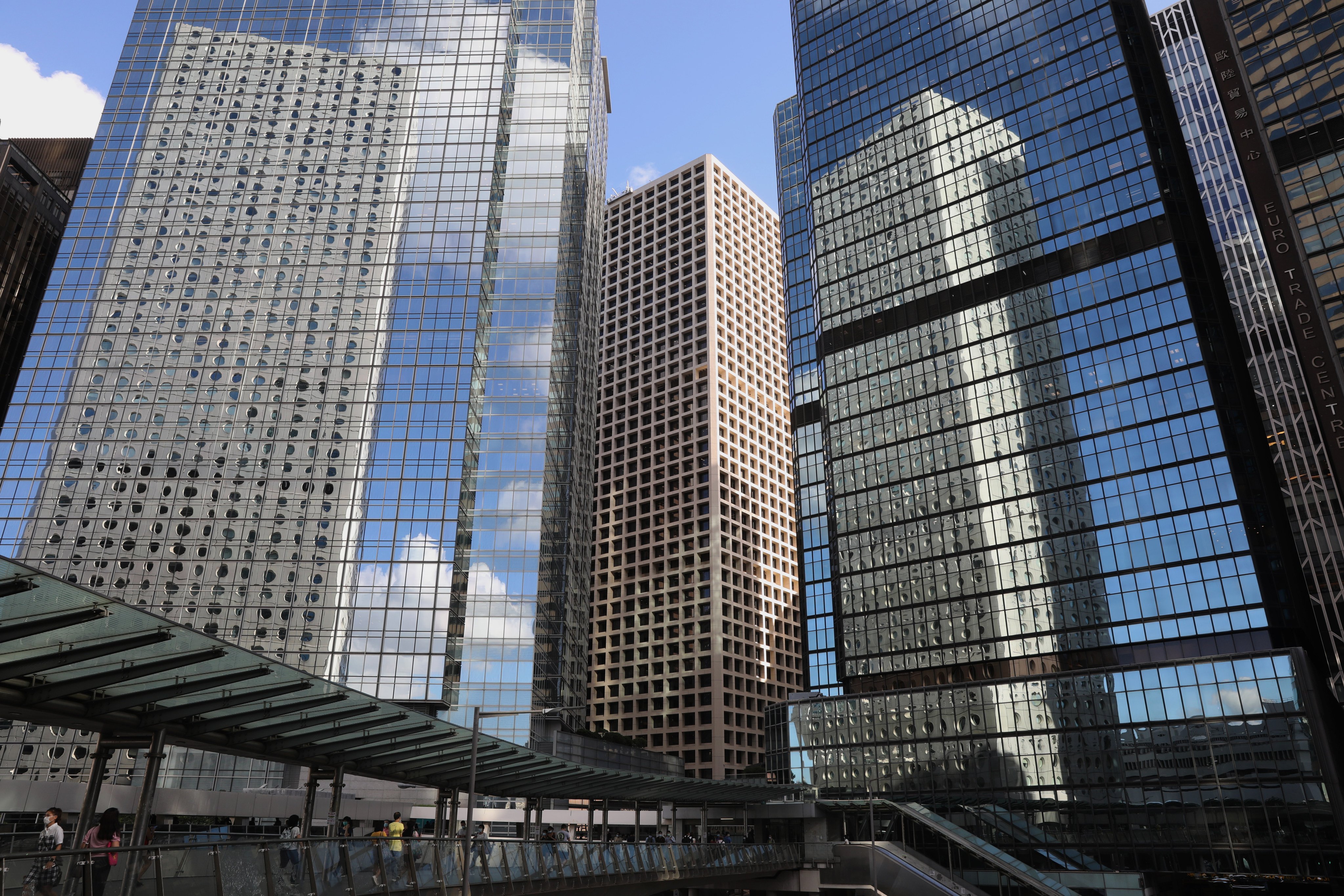 Jardine House appears in reflection (left) among other office buildings in Hong Kong’s Central district on June 11, 2020. Photo: Dickson Lee