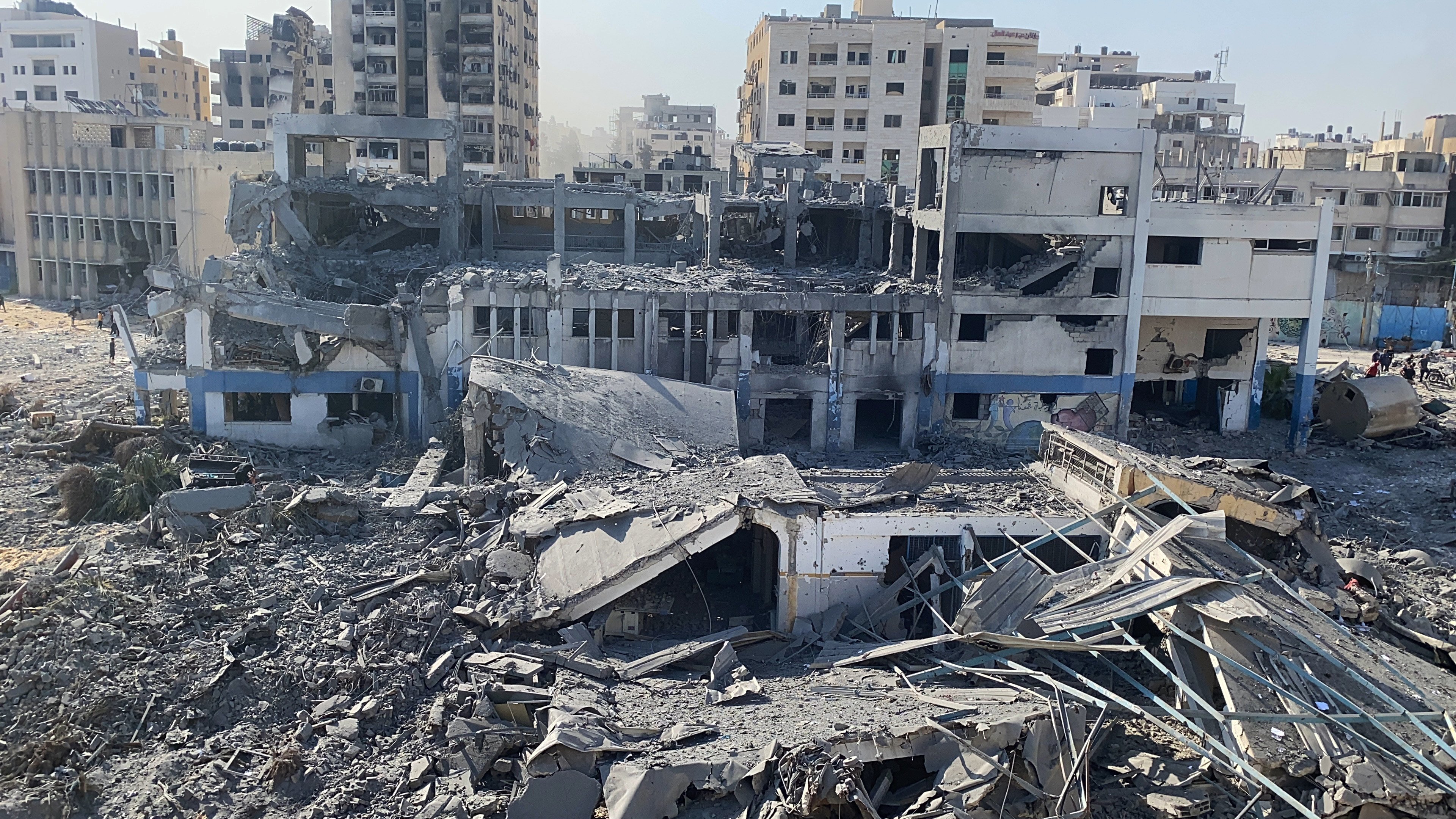 The damaged UN Relief and Works Agency for Palestine Refugees (UNRWA) building complex is seen in western Gaza City’s Al-Sinaa neighbouhood on Friday following the withdrawal of Israeli troops from the area. Photo: APA Images via ZUMA Press Wire/dpa