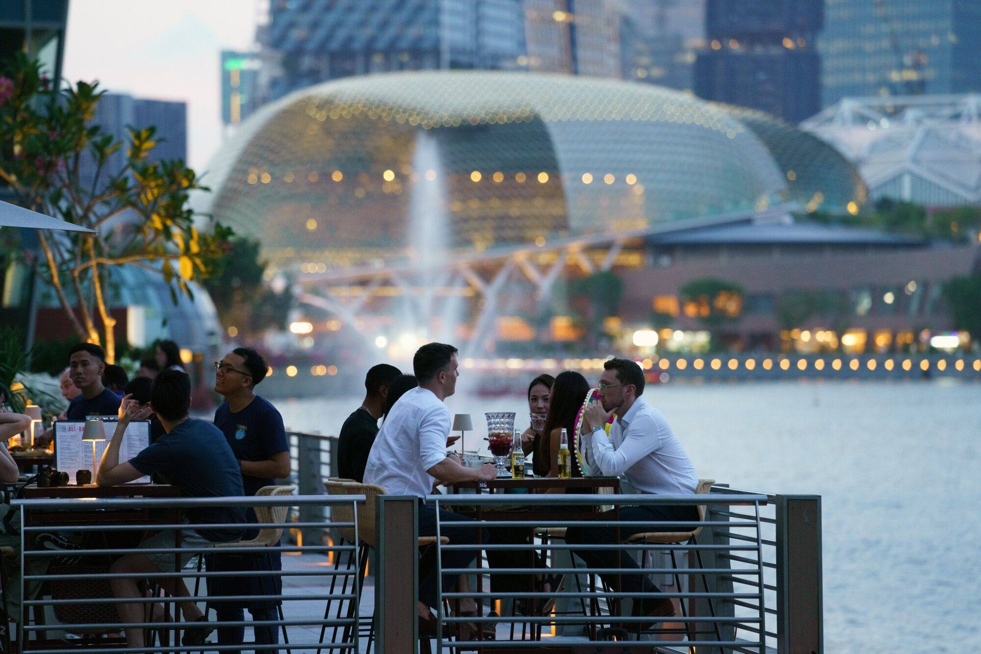 According to a survey, 62 per cent of Singaporeans said going to a restaurant at least once a month was essential. Photo: Bloomberg