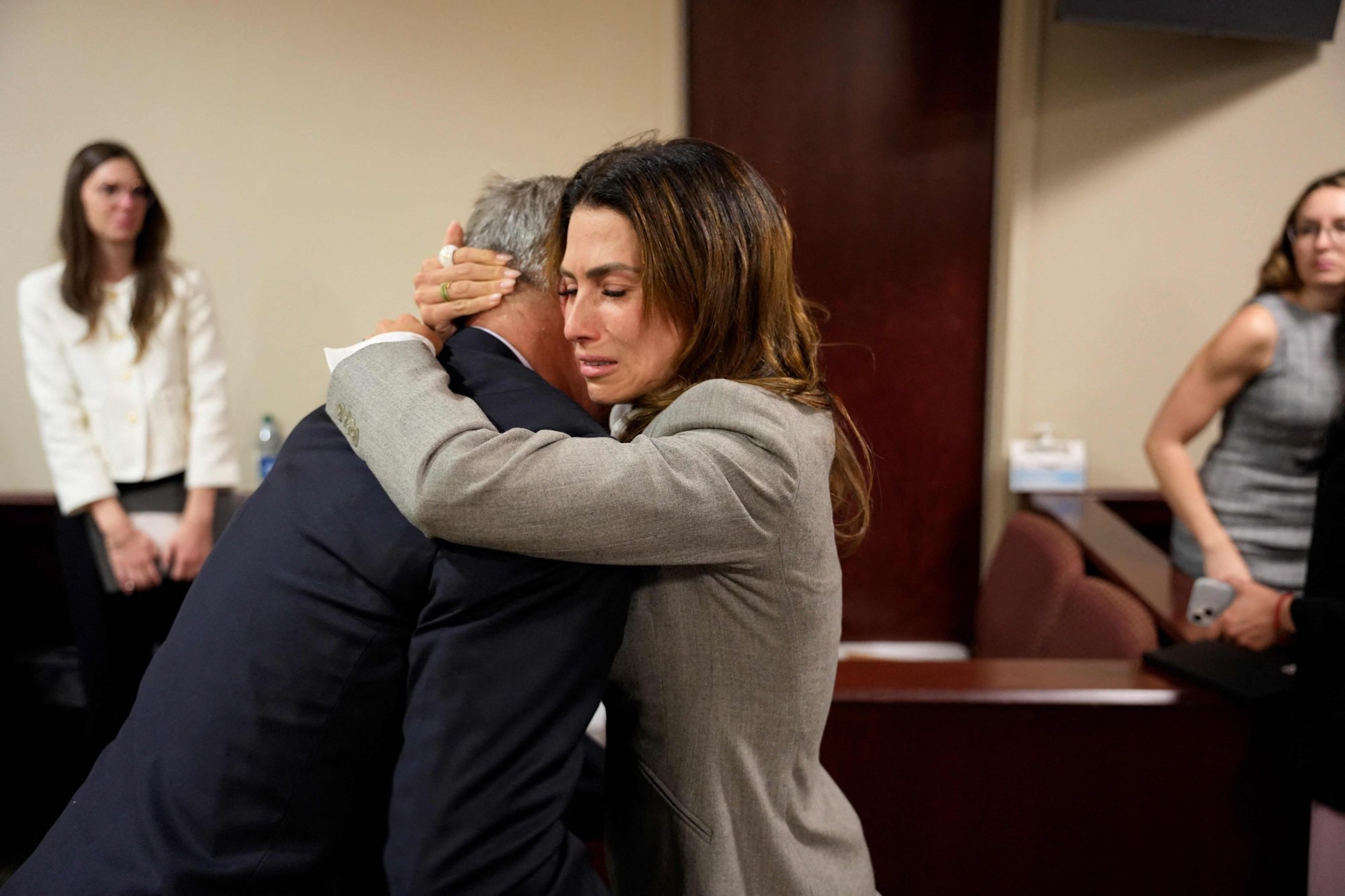 US actor Alec Baldwin and his wife Hilaria Baldwin embrace during his trial in Santa Fe, New Mexico, on Friday. Photo: AFP