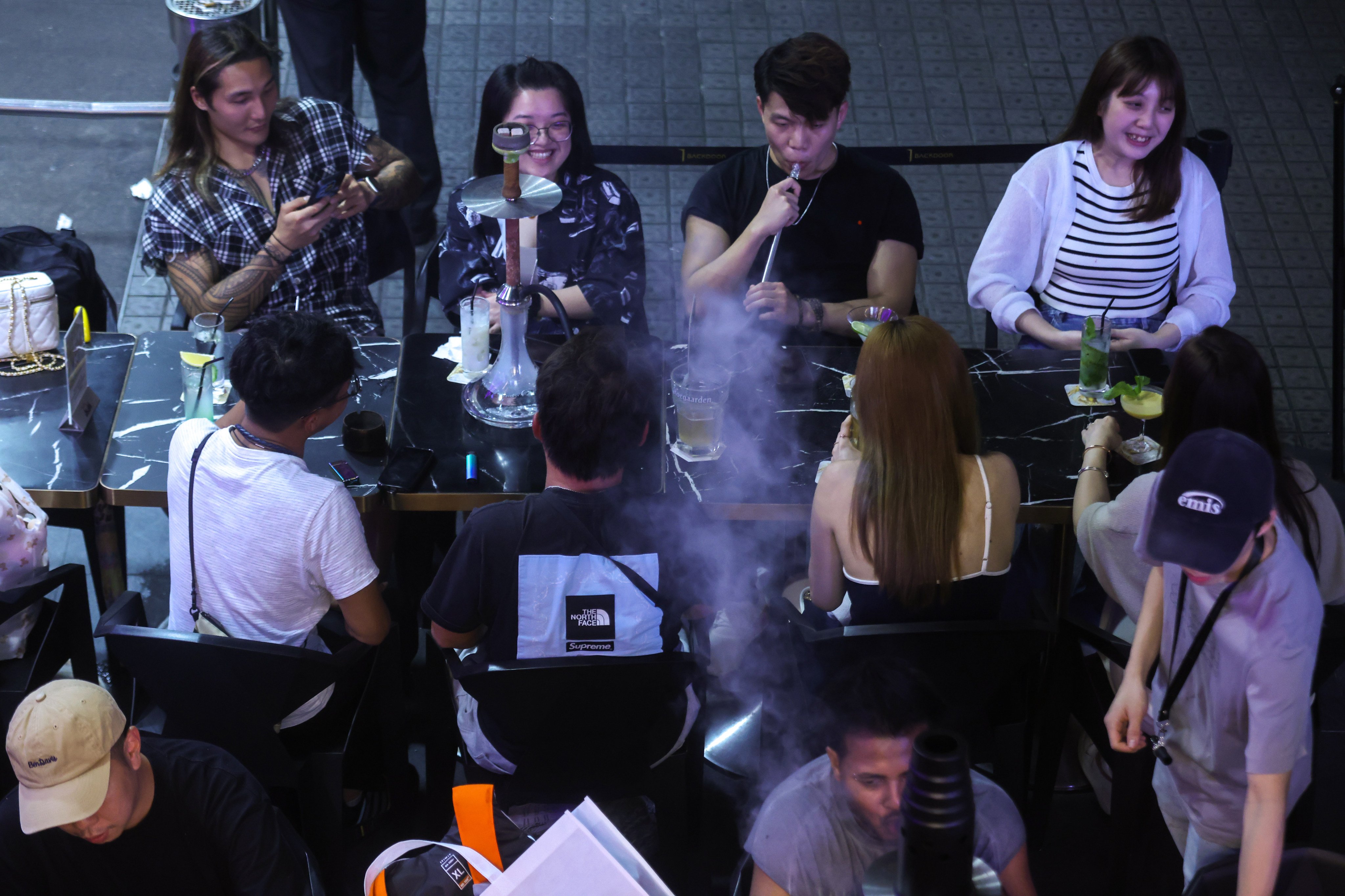 Shisha smoking is particularly popular among young people, especially women, with about a quarter of university students saying they had tried it in a 2020 HKU study. Photo: Jonathan Wong