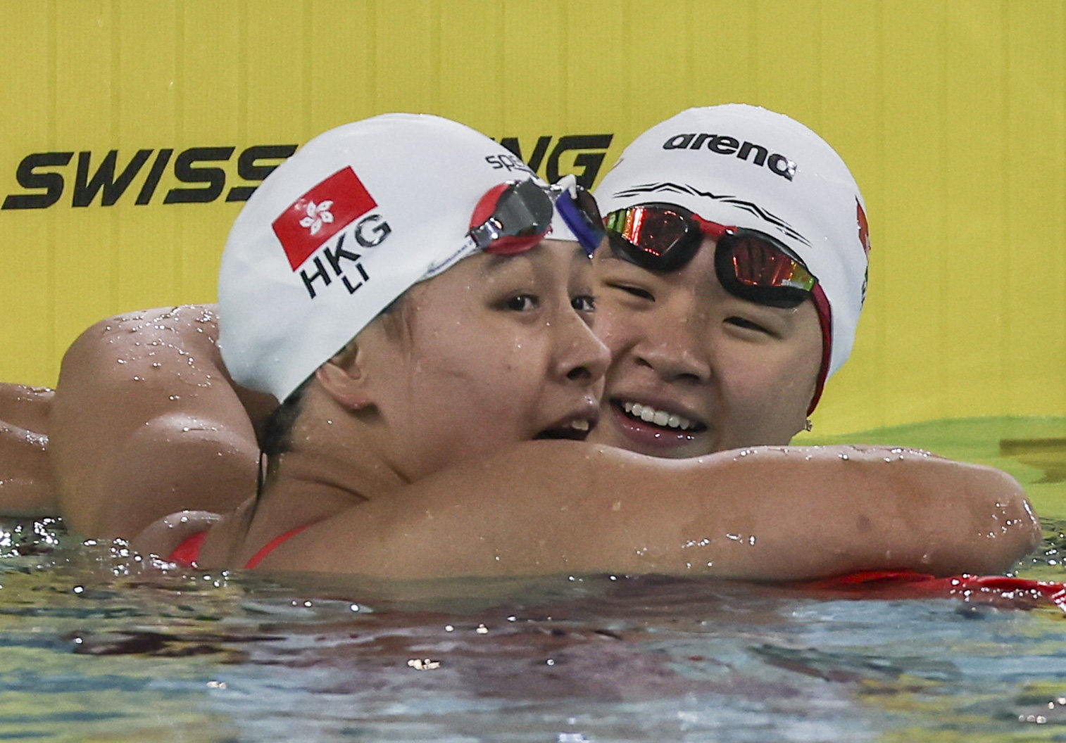 Li Sum-yiu (left) and Gilaine Ma compare notes after the 200m freestyle at Victoria Park. Photo: Edmond So