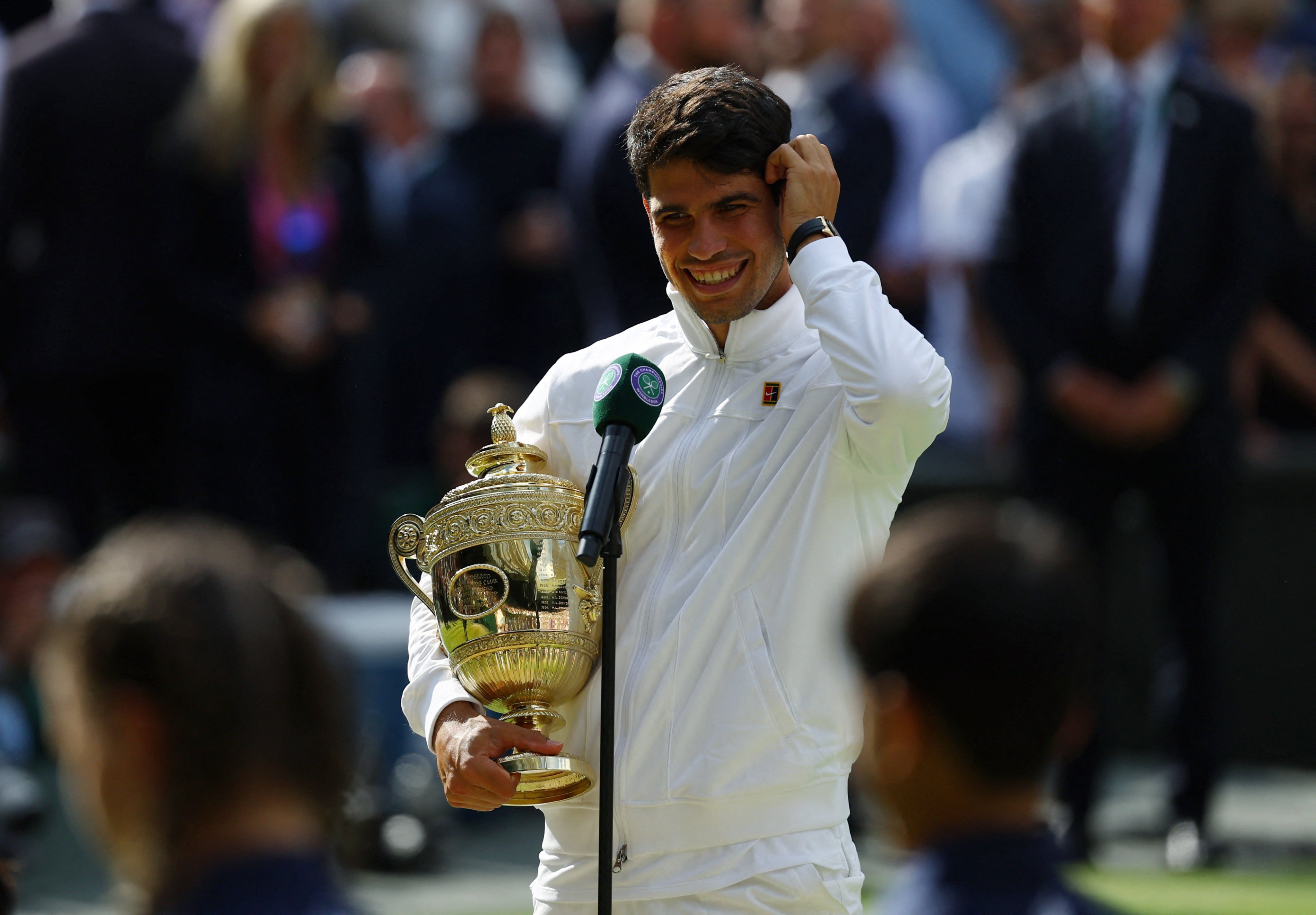 Spain’s Carlos Alcaraz with the Wimbledon trophy after winning the men’s singles final against Serbia’s Novak Djokovic in London on Sunday. Photo: Reuters