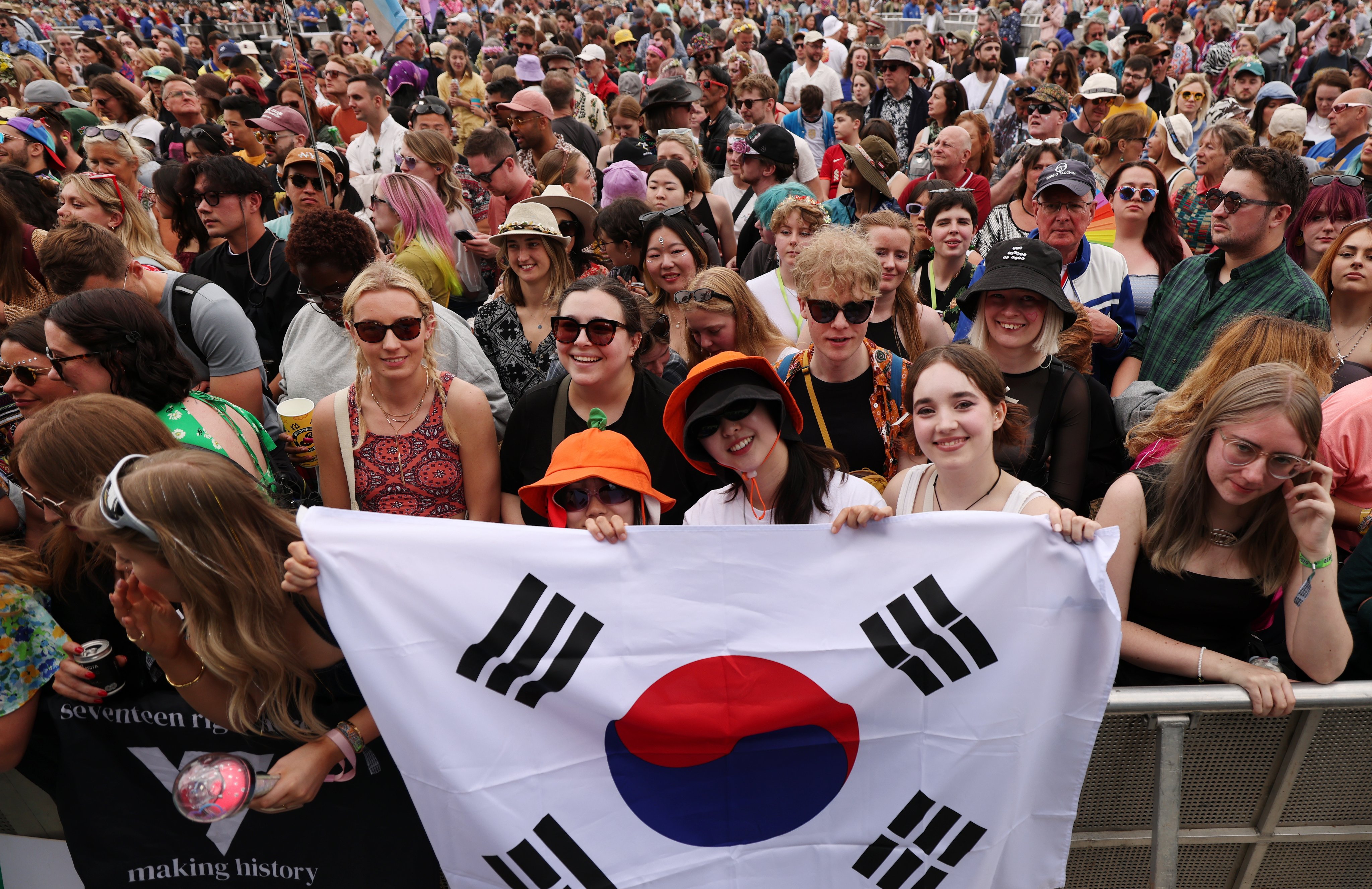 UK festival goers prepare to watch K-pop act Seventeen perform at Glastonbury Festival last month. Global spending on Korean music is estimated to grow to about US$11.6 billion this year. Photo: EPA-EFE