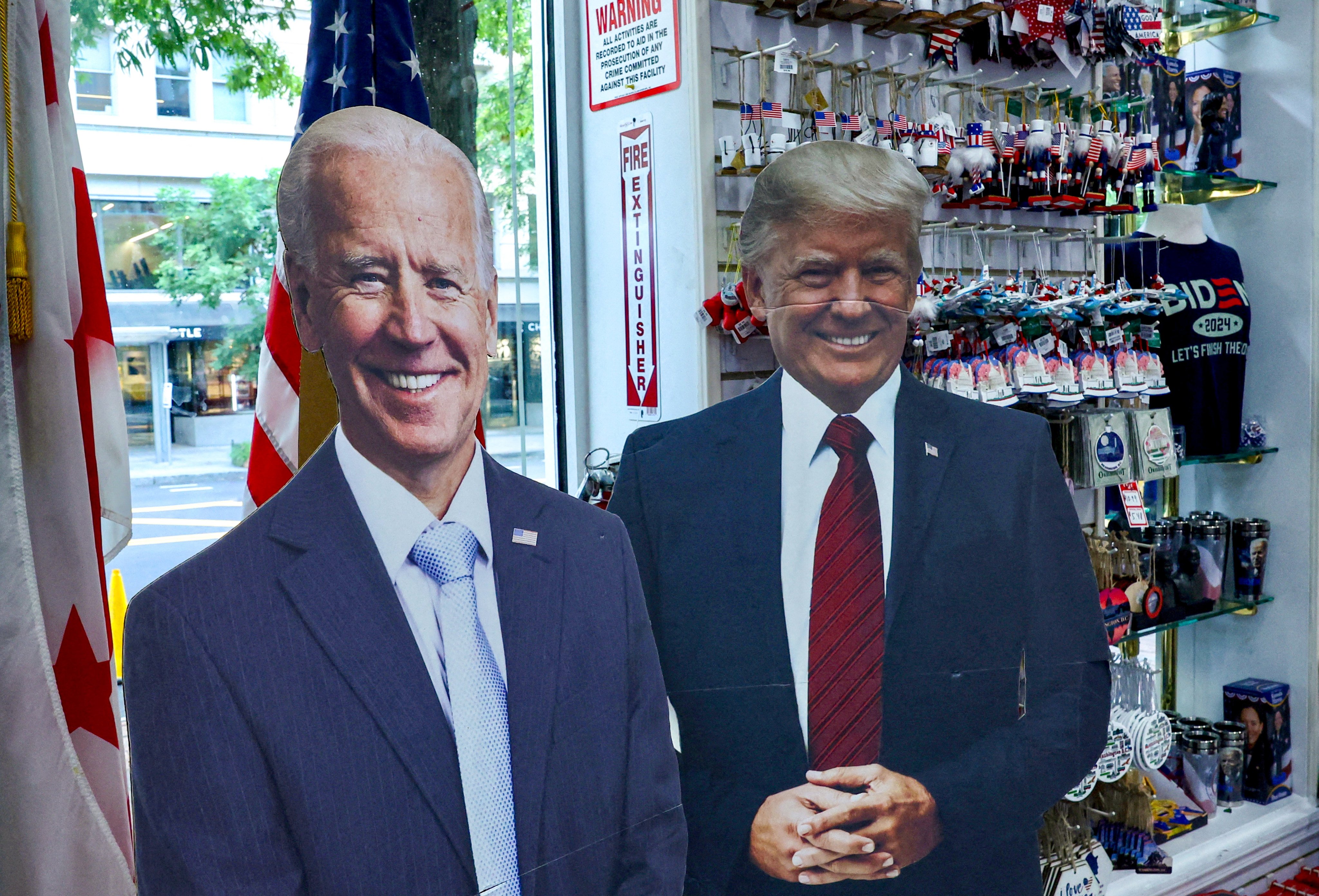 Cut-outs depicting US President Joe Biden and former president Donald Trump are displayed at a souvenir shop in Washington. Photo: Reuters