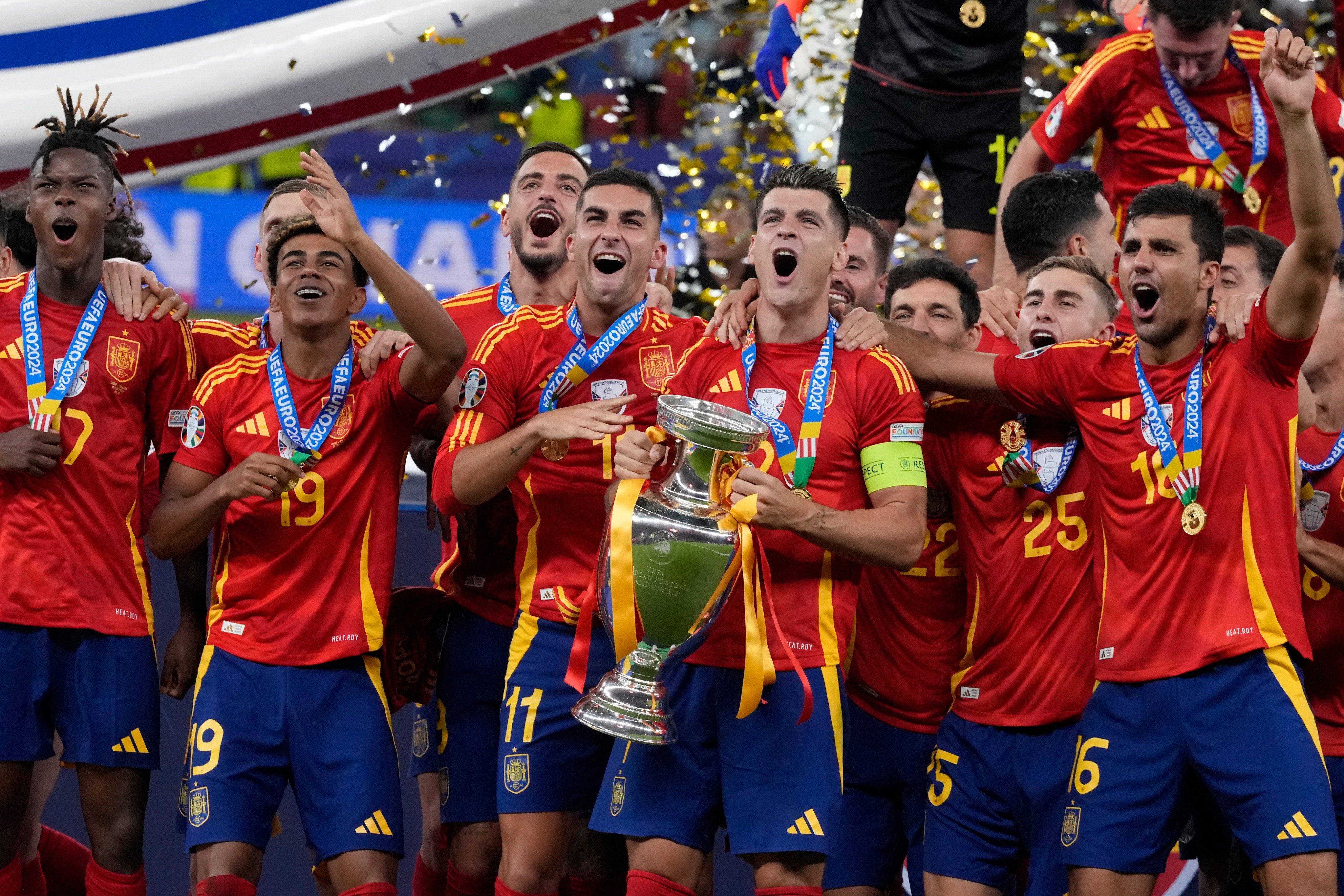 Spain captain Alvaro Morata starts the Euro 2024 trophy celebrations after their final victory over England. Photo: AP