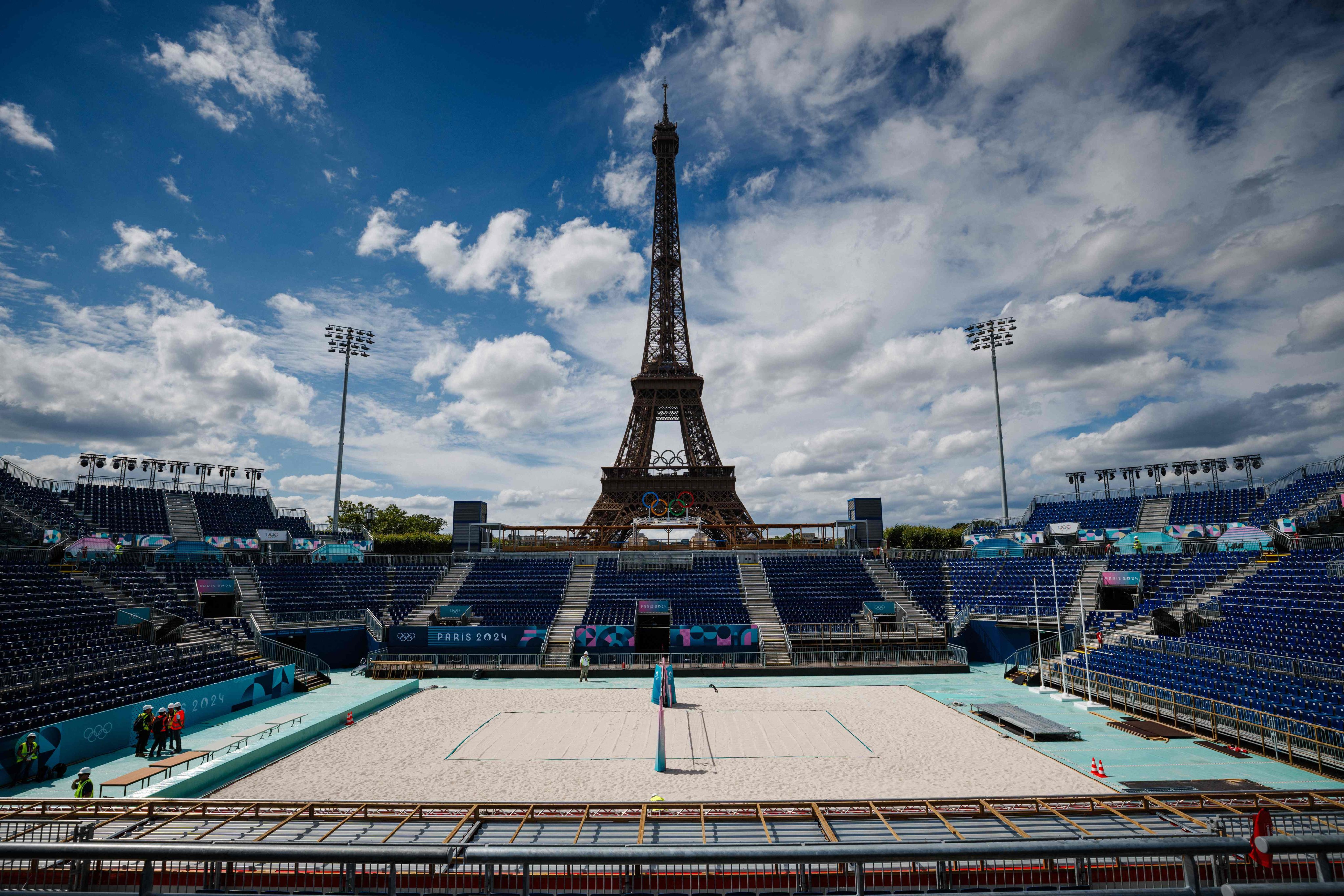 The Eiffel Tower stands behind Eiffel Tower Stadium, a venue for the Paris 2024 Olympics and Paralympic Games, at the Champ-De-Mars in Paris on July 10, 2024. Photo: AFP