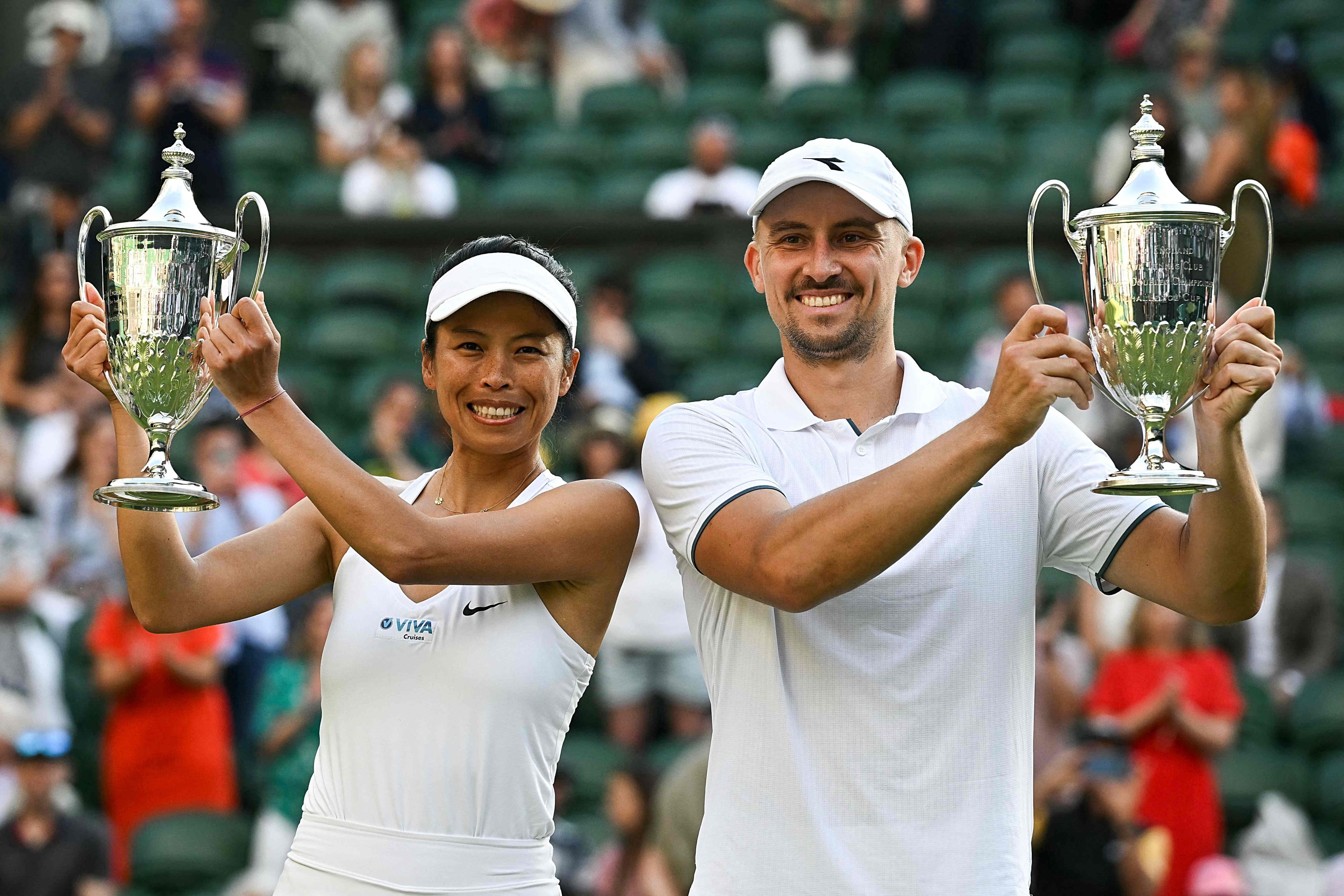 Taiwan’s Hsieh Su-wei (left) and Poland’s Jan Zielinski celebrate their victory at Wimbledon. Photo: AFP