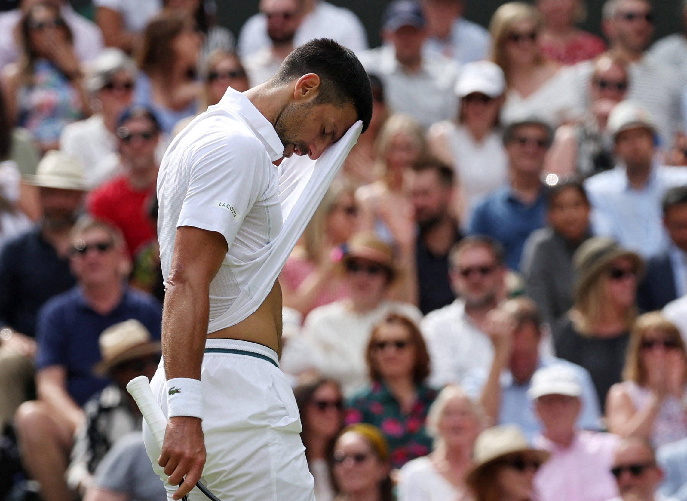 Novak Djokovic cuts a dejected figure during his Wimbledon final defeat to Carlos Alcaraz in straight sets. Photo: Reuters