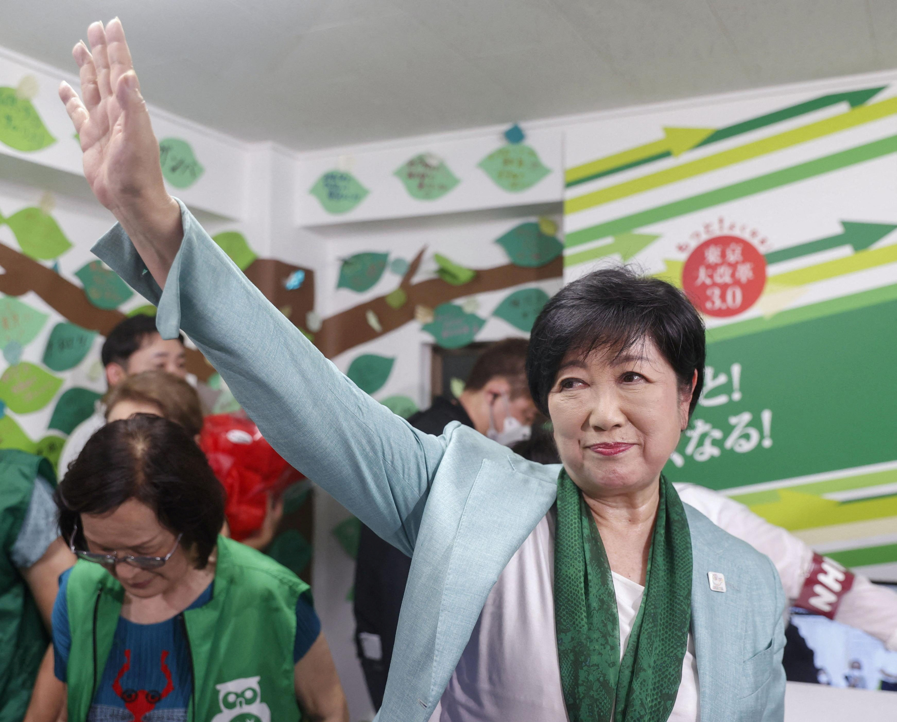 Tokyo governor Yuriko Koike waves to supporters right before her re-election victory on July 7. Photo: Reuters/Kyodo