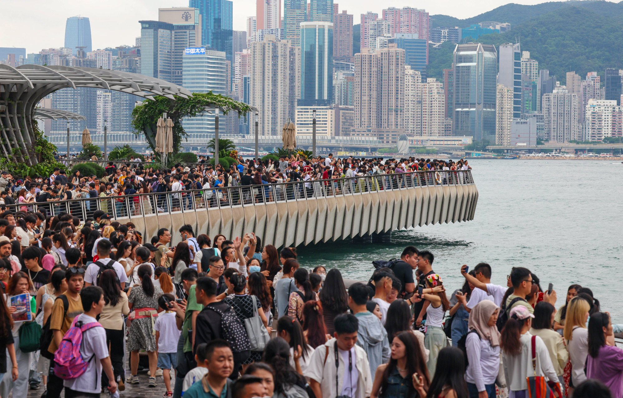 Tourists visit the Avenue of Stars in Tsim Sha Tsui during the Labour Day Golden Week. Photo: Jelly Tse