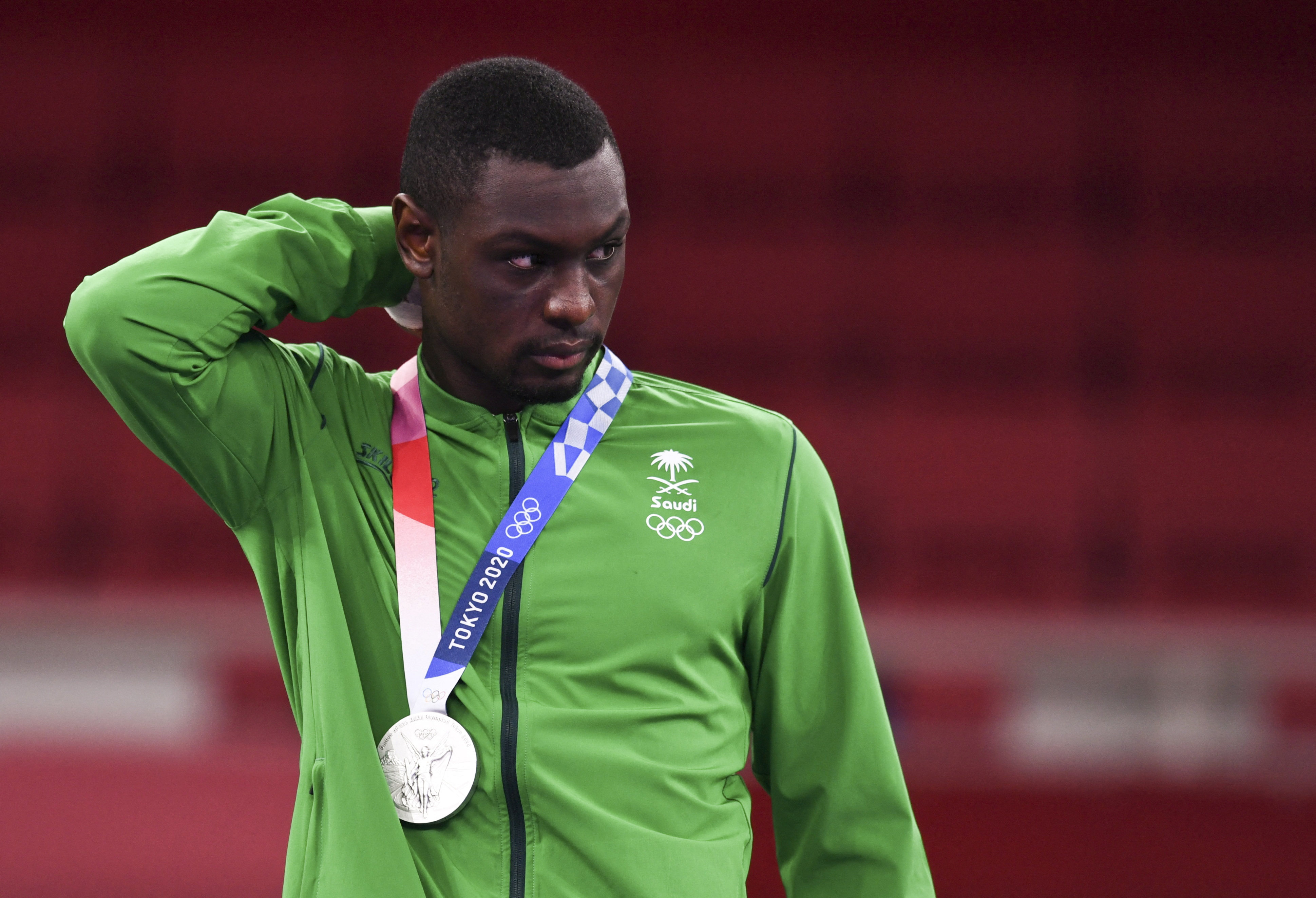 Saudi Arabia’s Tareg Hamedi won a silver medal in karate at the Tokyo Games, but was rewarded at home as though he had won a gold medal. Photo: Reuters