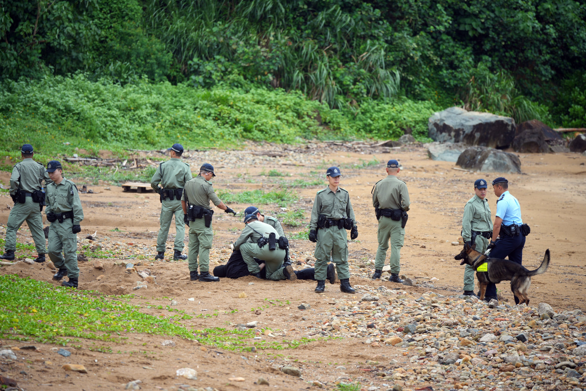 Police and rural patrol cadre officers use drones and police dogs in a burglar-busting exercise mounted in Sai Kung. Photo: May Tse