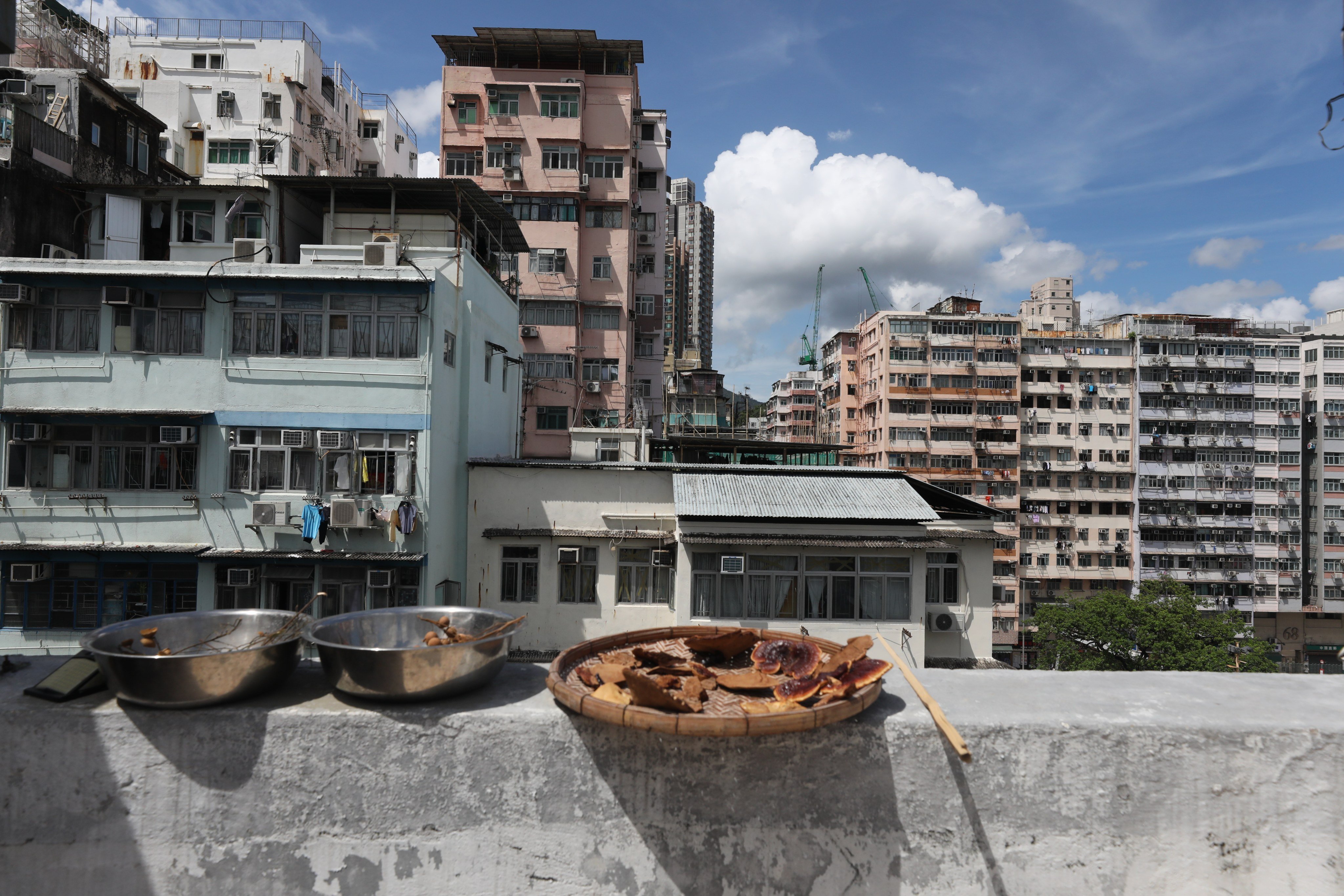 A glimpse of residential buildings in Sham Shui Po, one of seven districts facing redevelopment. Photo: Xiaomei Chen
