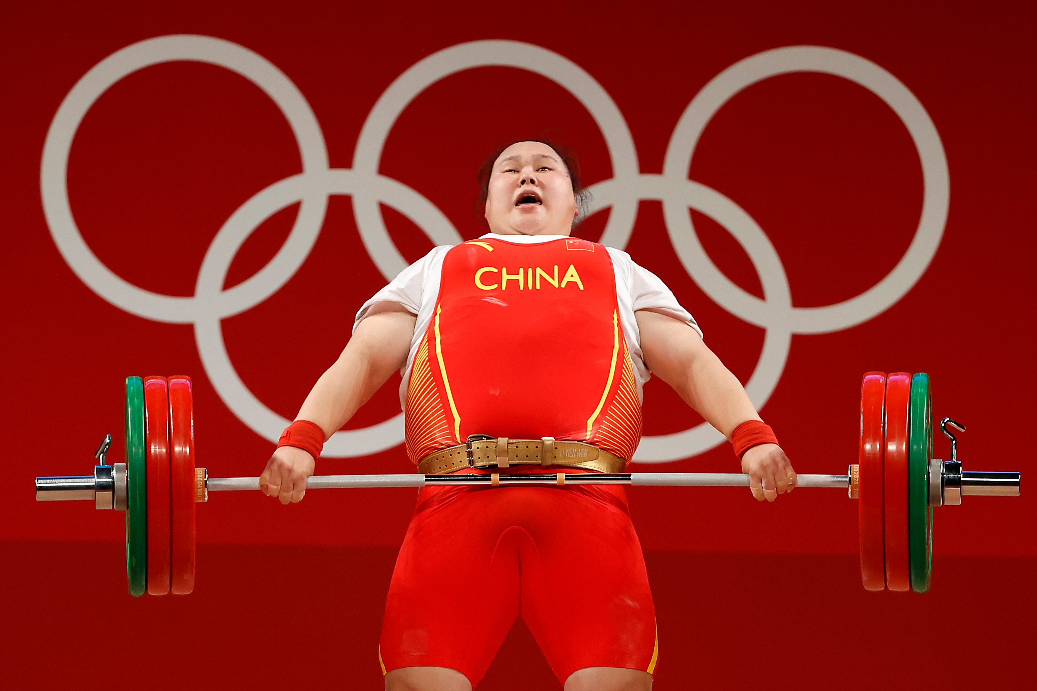 Li Wenwen of China breaks the +87kg category Olympic record by lifting 140kg at the Tokyo Olympics. Photo: EPA-EFE