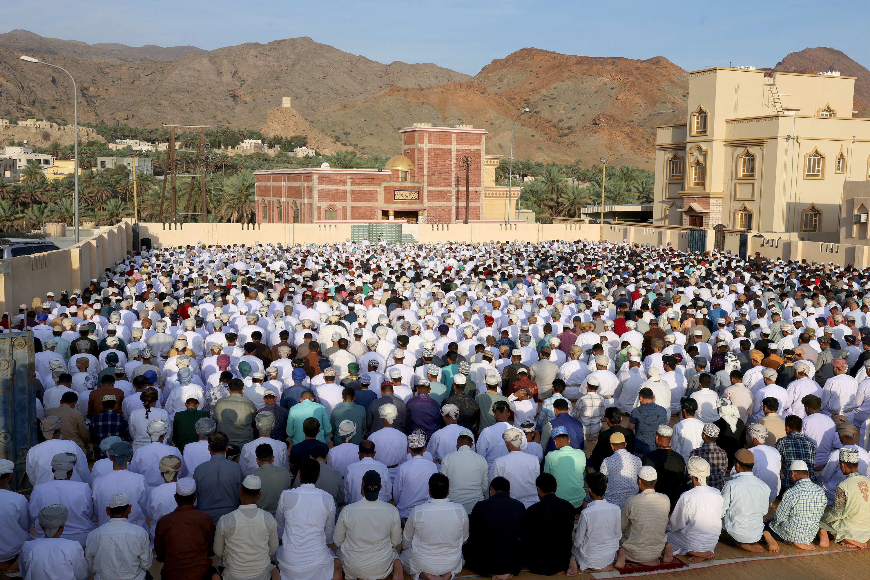 Muslim men perform morning prayer in Oman. Tuesday’s attack stunned the peaceful sultanate. Photo: AFP/Getty Images/TNS