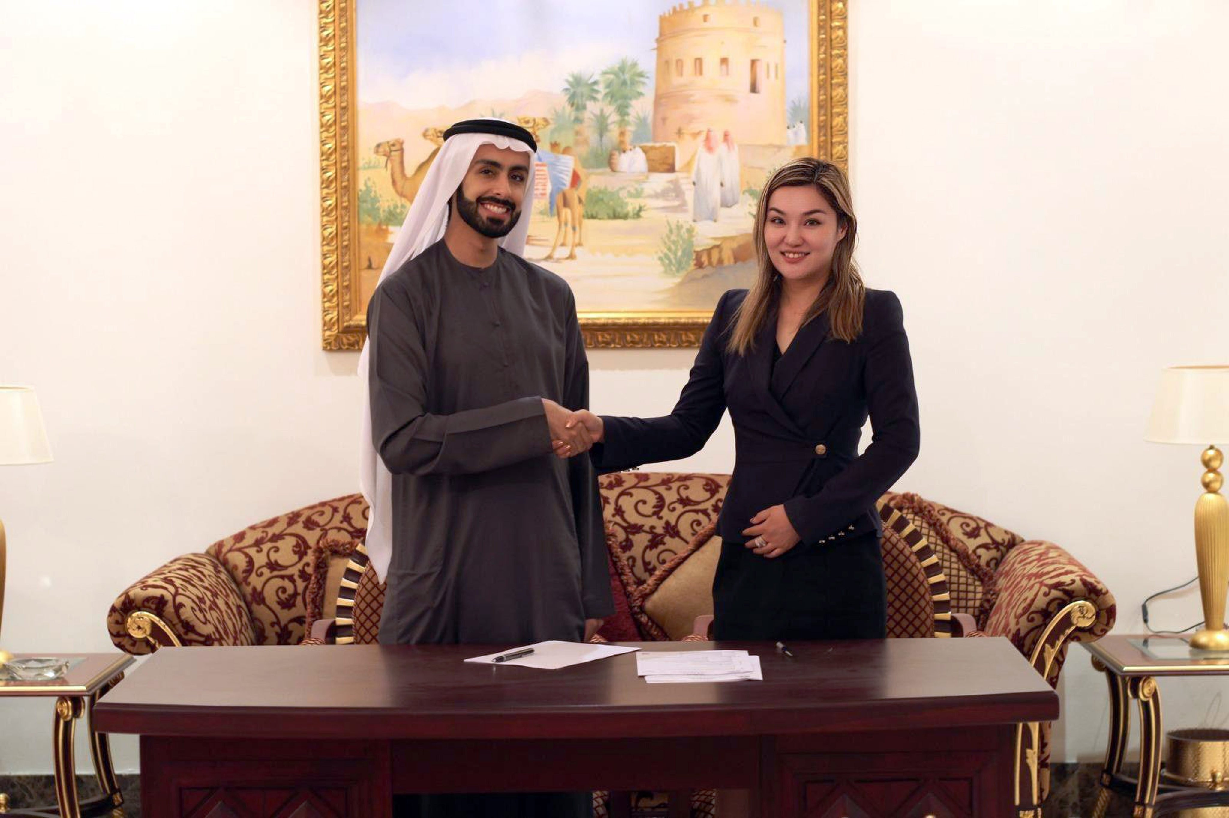 Sheikh Ali Al Maktoum (left) and then Hong Kong family office CEO Eleanor Mak after the Dubai signing of a document to set up in Hong Kong. Photo: Handout