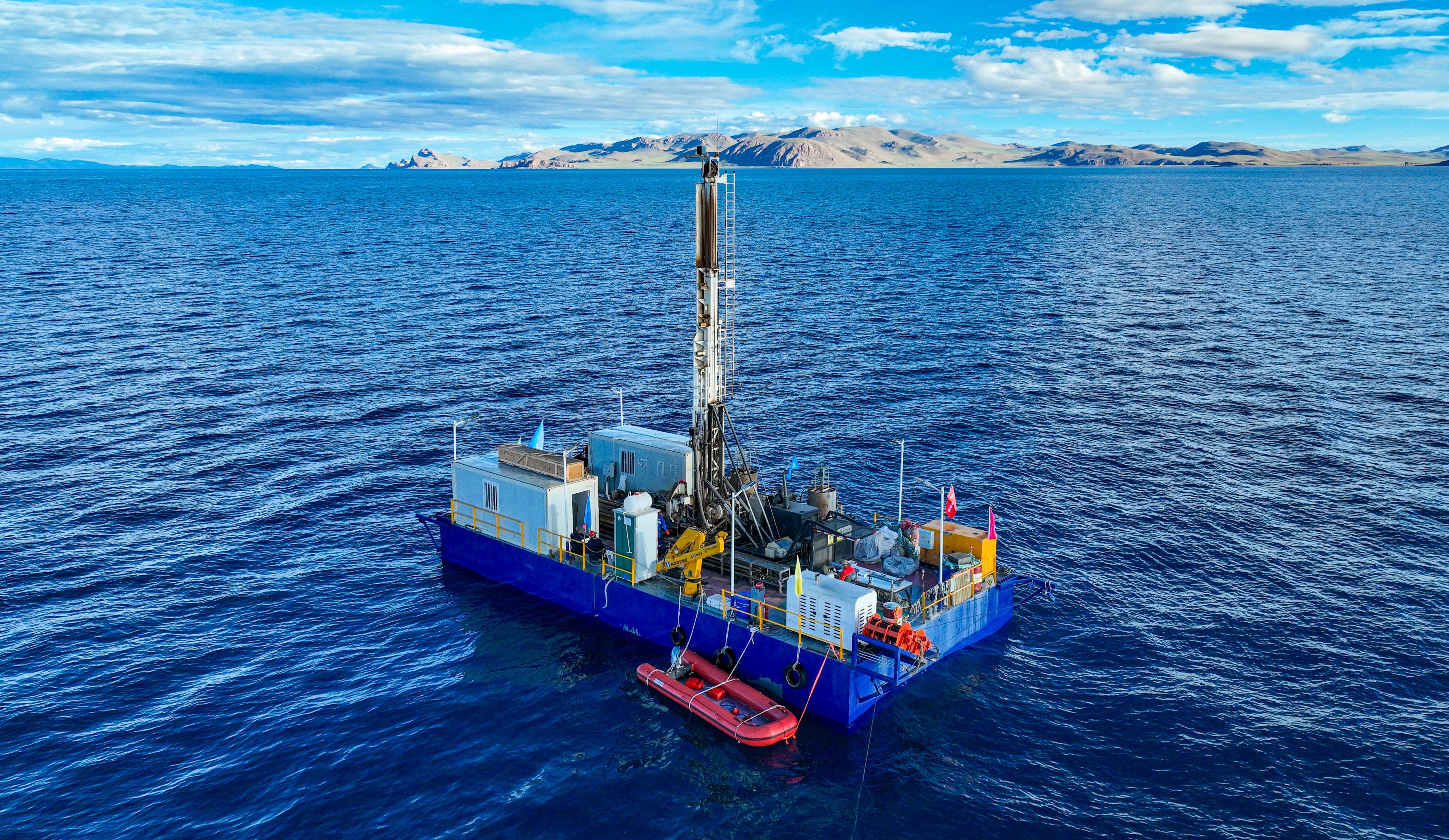 Crews on a platform on Nam Co in Tibet have drilled to a record depth of 510 metres to extract core samples that could be vital to understanding what the future holds for the region. Photo: Xinhua