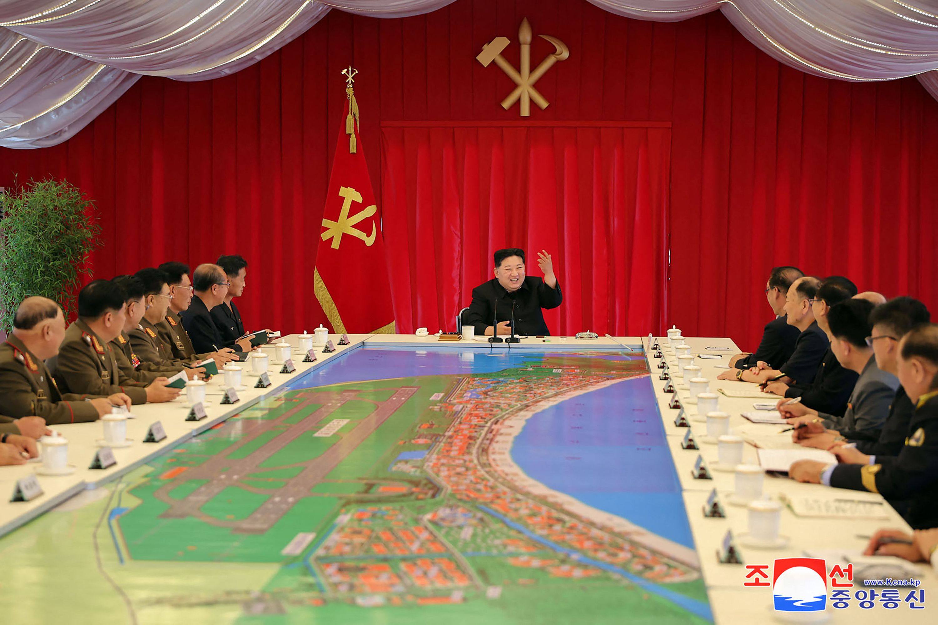 North Korean leader Kim Jong-un attends a conference at the Wonsan Kalma coast tourist area, which is currently under construction in North Korea’s Gangwon Province. Photo: KCNA via KNS/AFP
