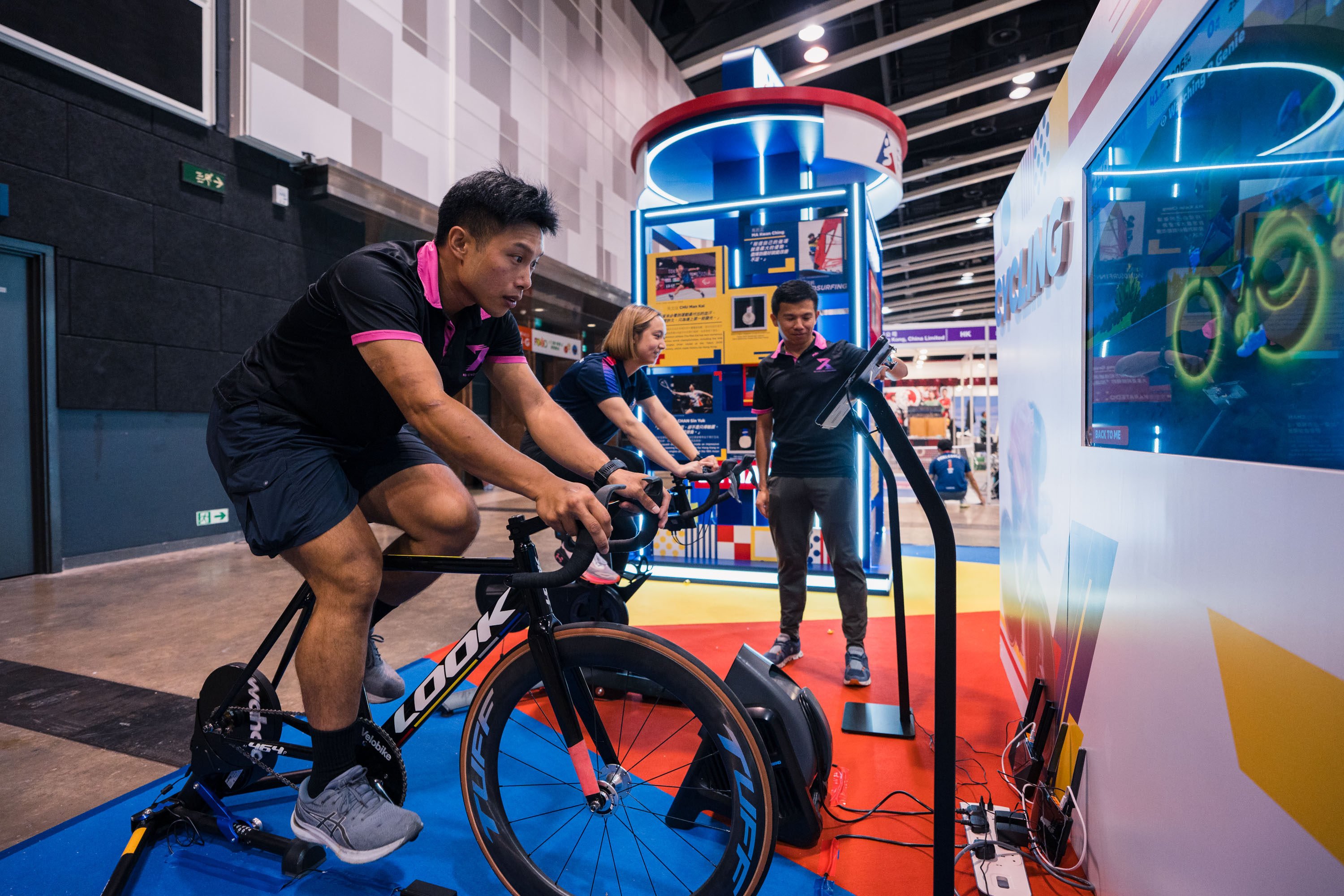 Simulated road and track cycling that allows visitors to understand the determination and perseverance an athlete needs to compete is one of several fitness and wellness activities you can try in Hong Kong this weekend. Photo: HKSI