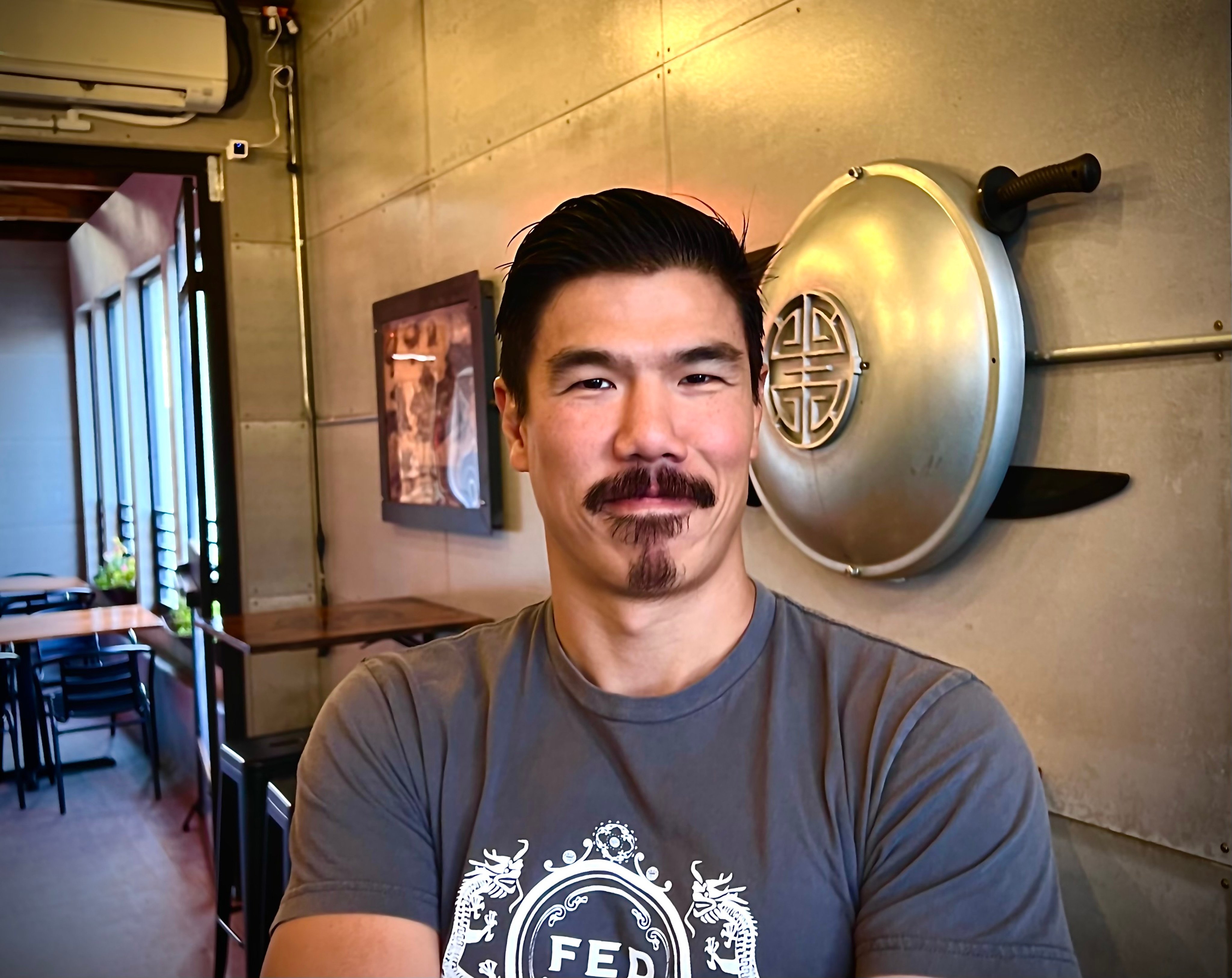 Kevin Wong (above) is a fan of martial arts, which has inspired his restaurant, Far East Descendant. It is decorated in the style of the Donnie Yen film New Dragon Gate Inn, and has dishes with names including Five Deadly Venoms. Photo: Far East Descendant