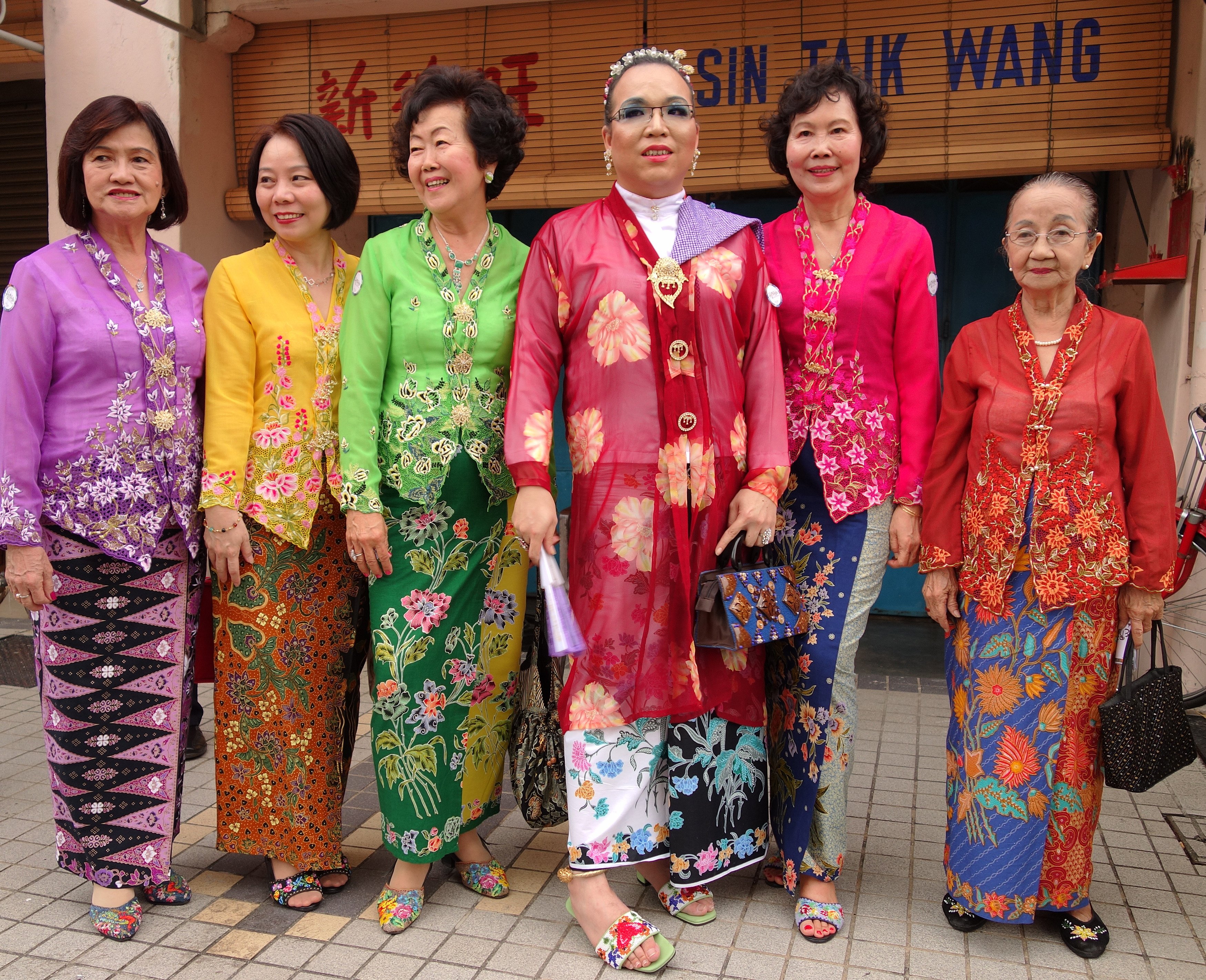 Baba Nyonya pose in Penang, Malaysia, in 2013 as part of a celebration of the conferring by Unesco of World Heritage Site status on the state capital, George Town. Baba Nyonya, or Chinese Peranakans, show the upsides to cultural assimilation. Photo: Shutterstock Images